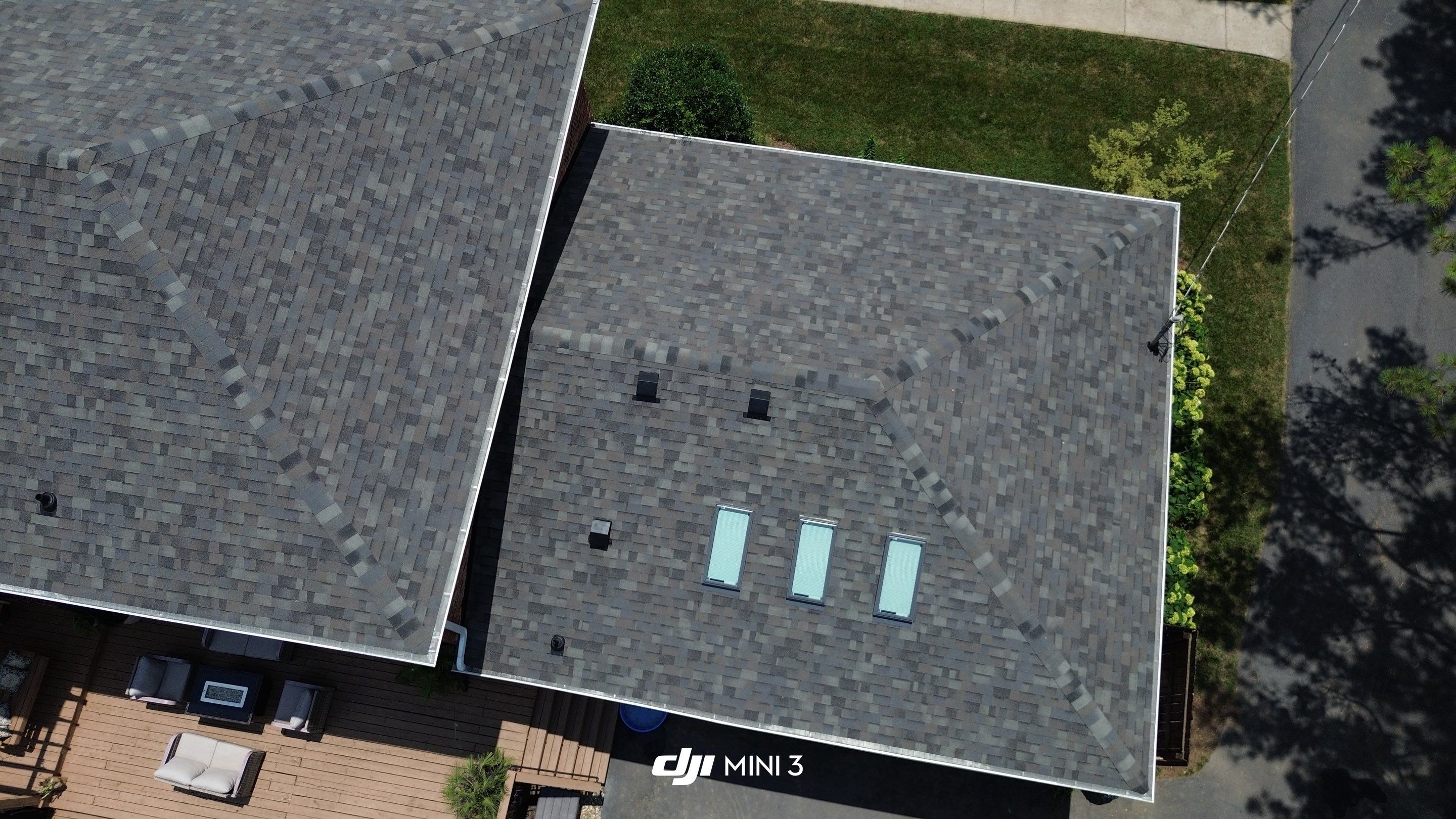 Full Roof Replacement and Skylight Installation for Franklin Colonial Home by Shinglesmiths Roofing