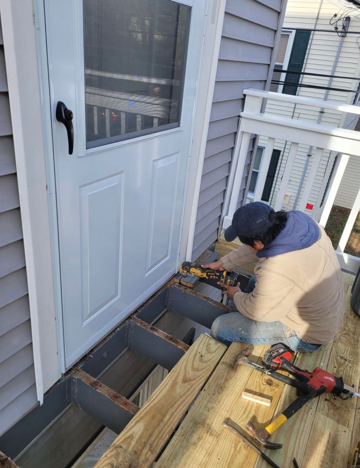 Deck Installation using Pressure treated railing by A Plus Exterior