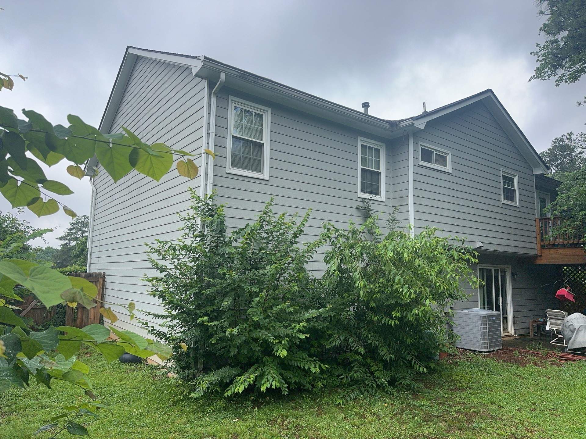 Alpharetta, GA Partial Siding Replacement, Porch Stain, and Exterior Painting by Nelson Exteriors 
