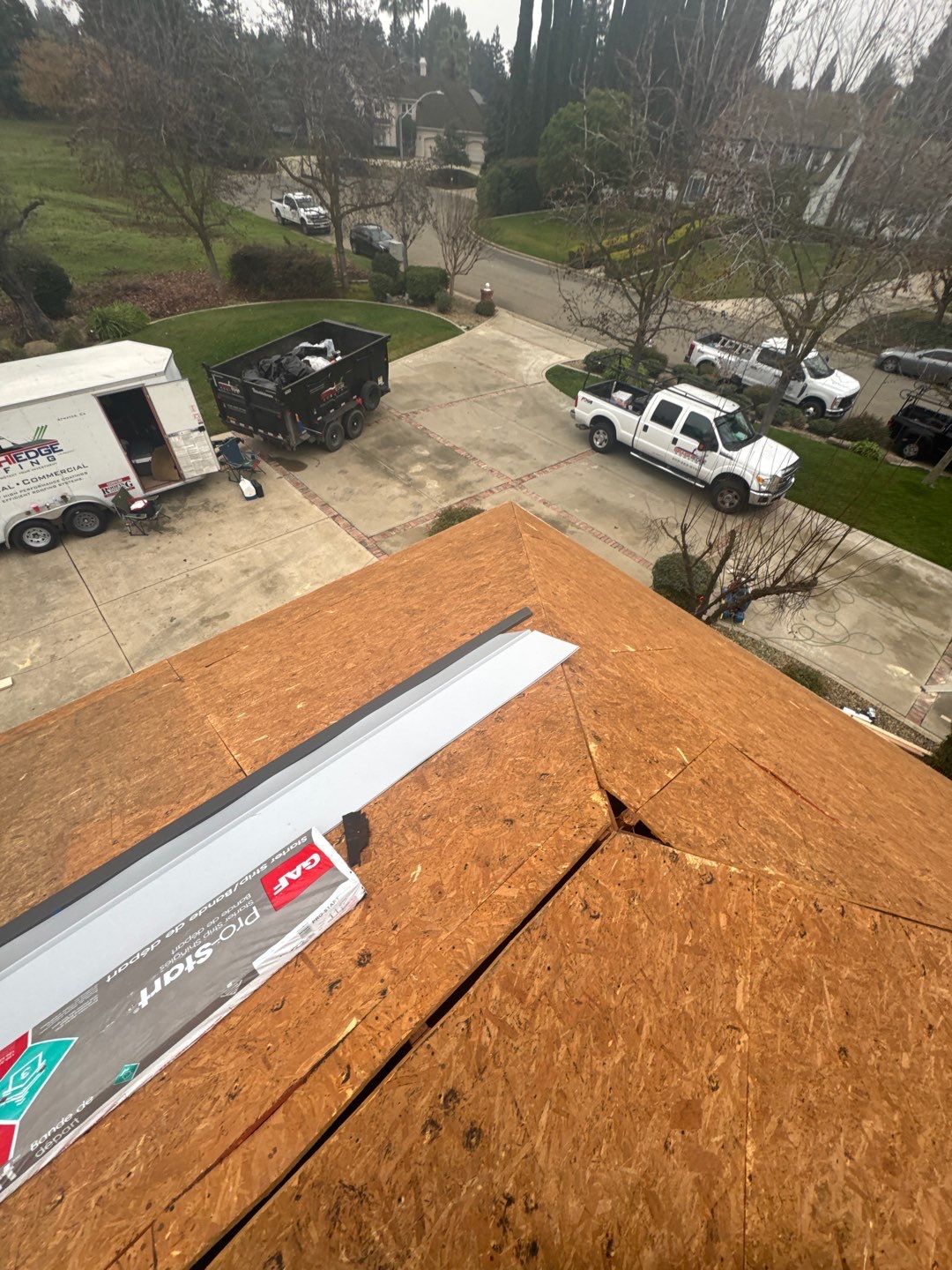 New shingles and gutters using GAF Timberline HDZ shingles and aluminum gutter by Straight Edge Roofing Inc