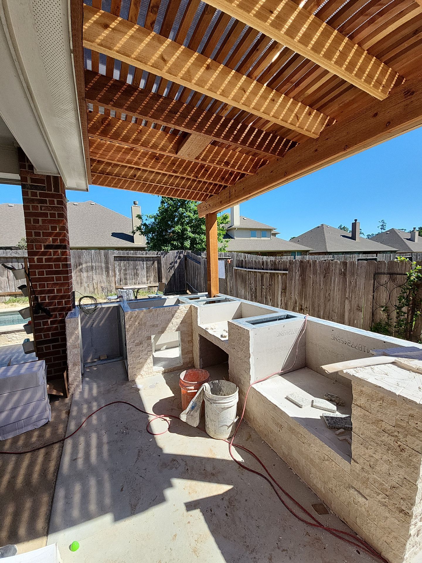Pergola and Summer Kitchen in Conroe, TX by SophAlx LLC