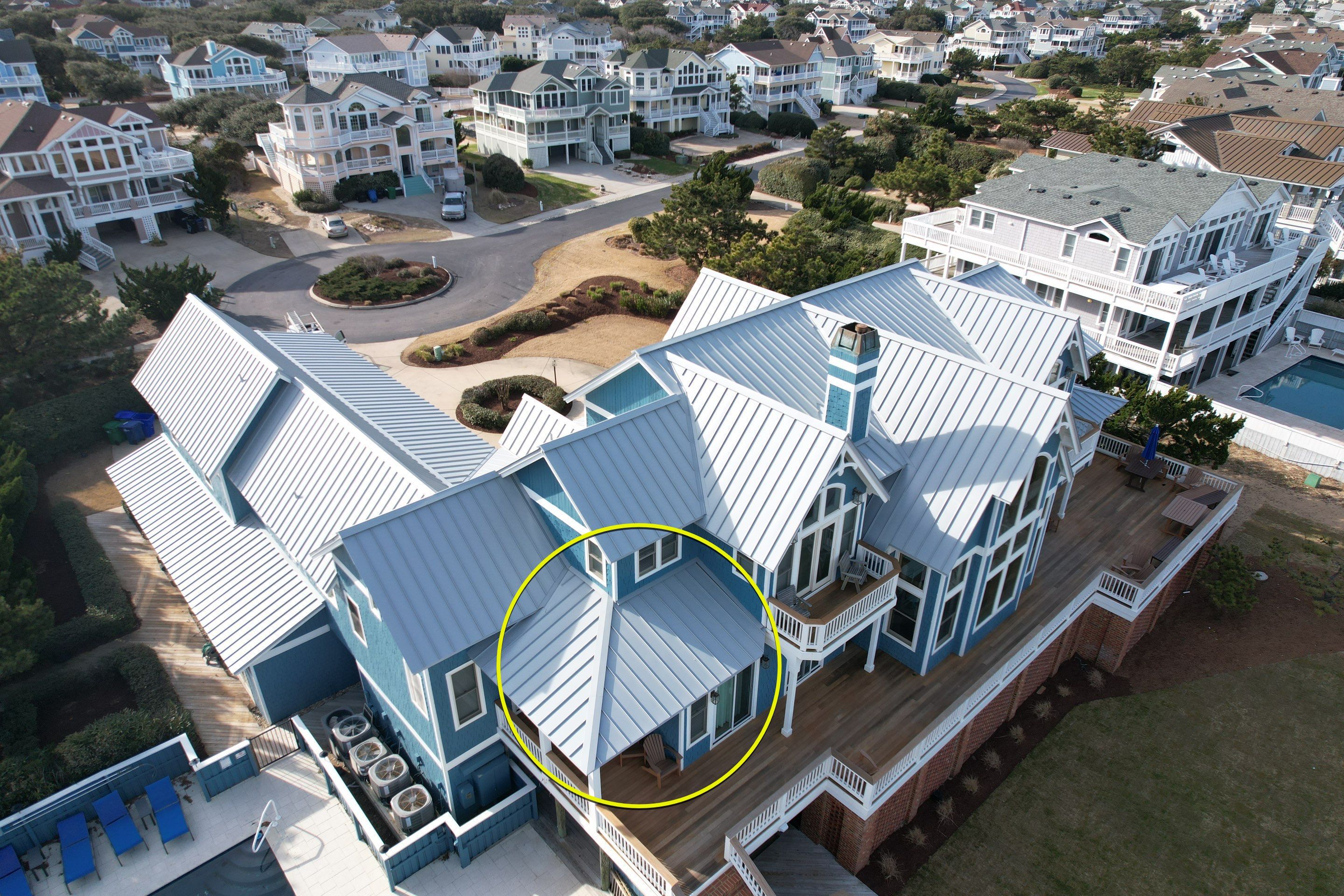 Large Metal Roof Transformation by Gallop Roofing & Remodeling, Inc.