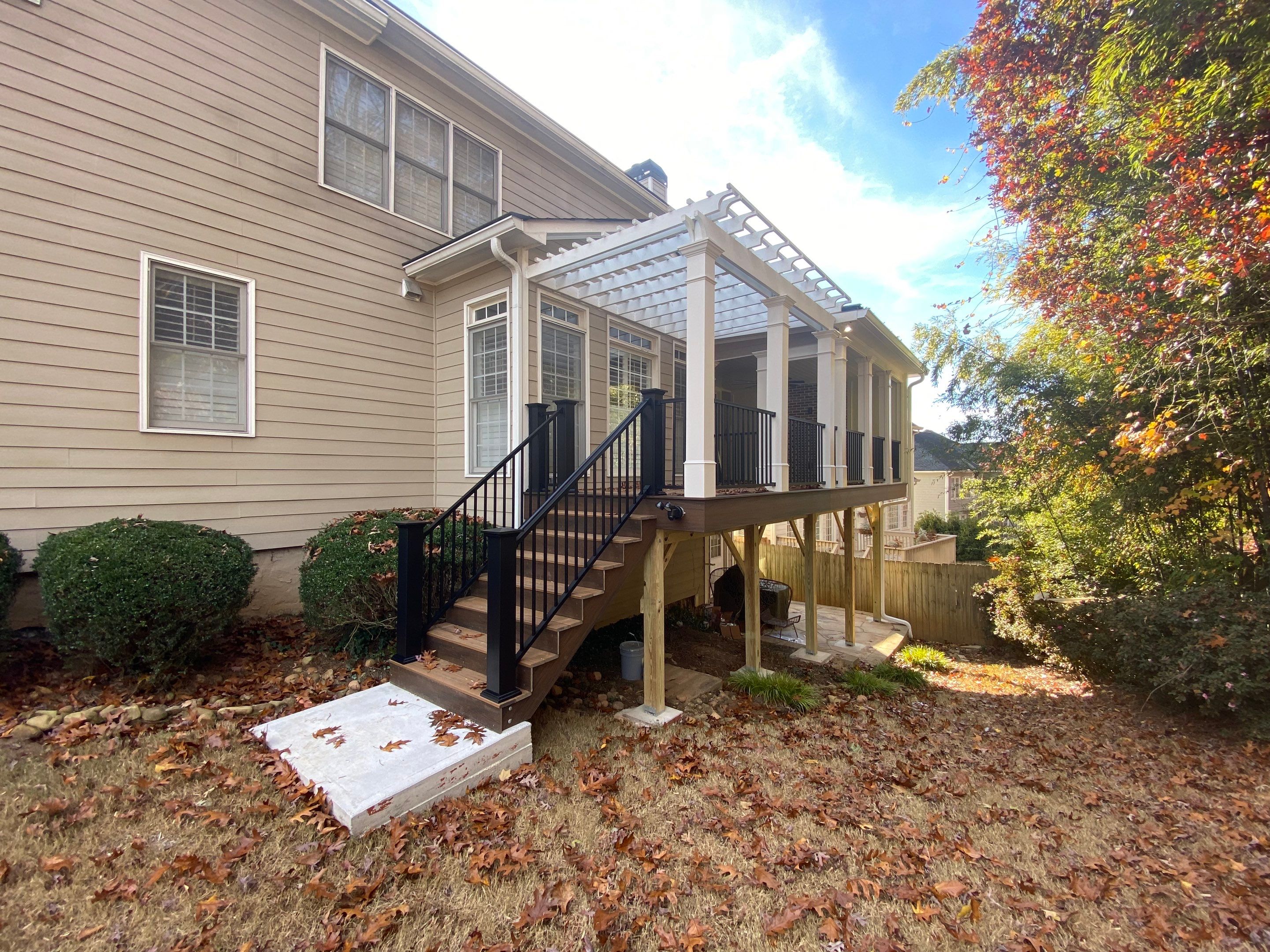 Smyrna Composite Deck and Covered Porch Renovation by Swift Home Renovations
