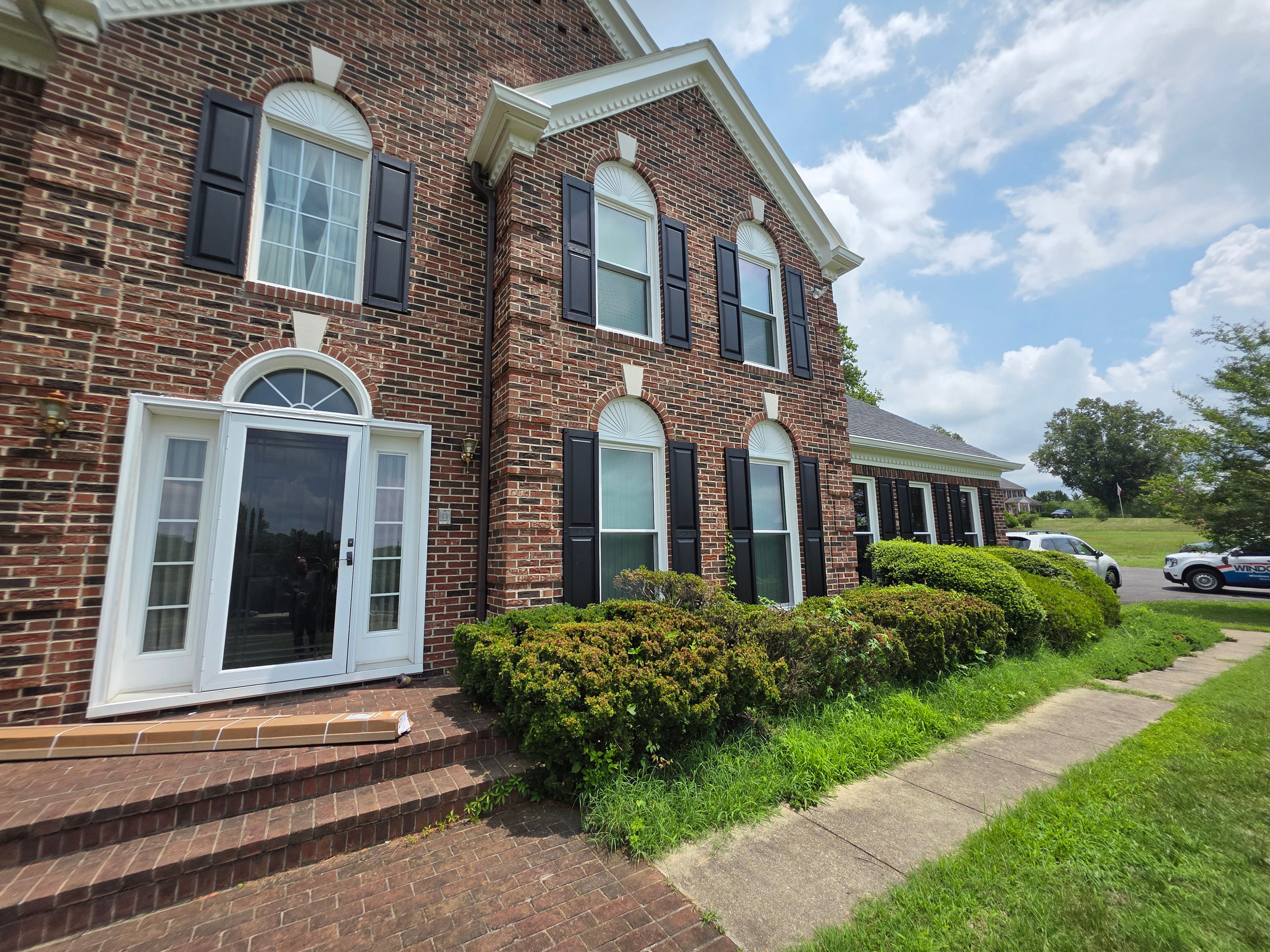 Vinyl Window Replacement for Two-Story Brick Home in Upper Marlboro by Window Depot of Annapolis