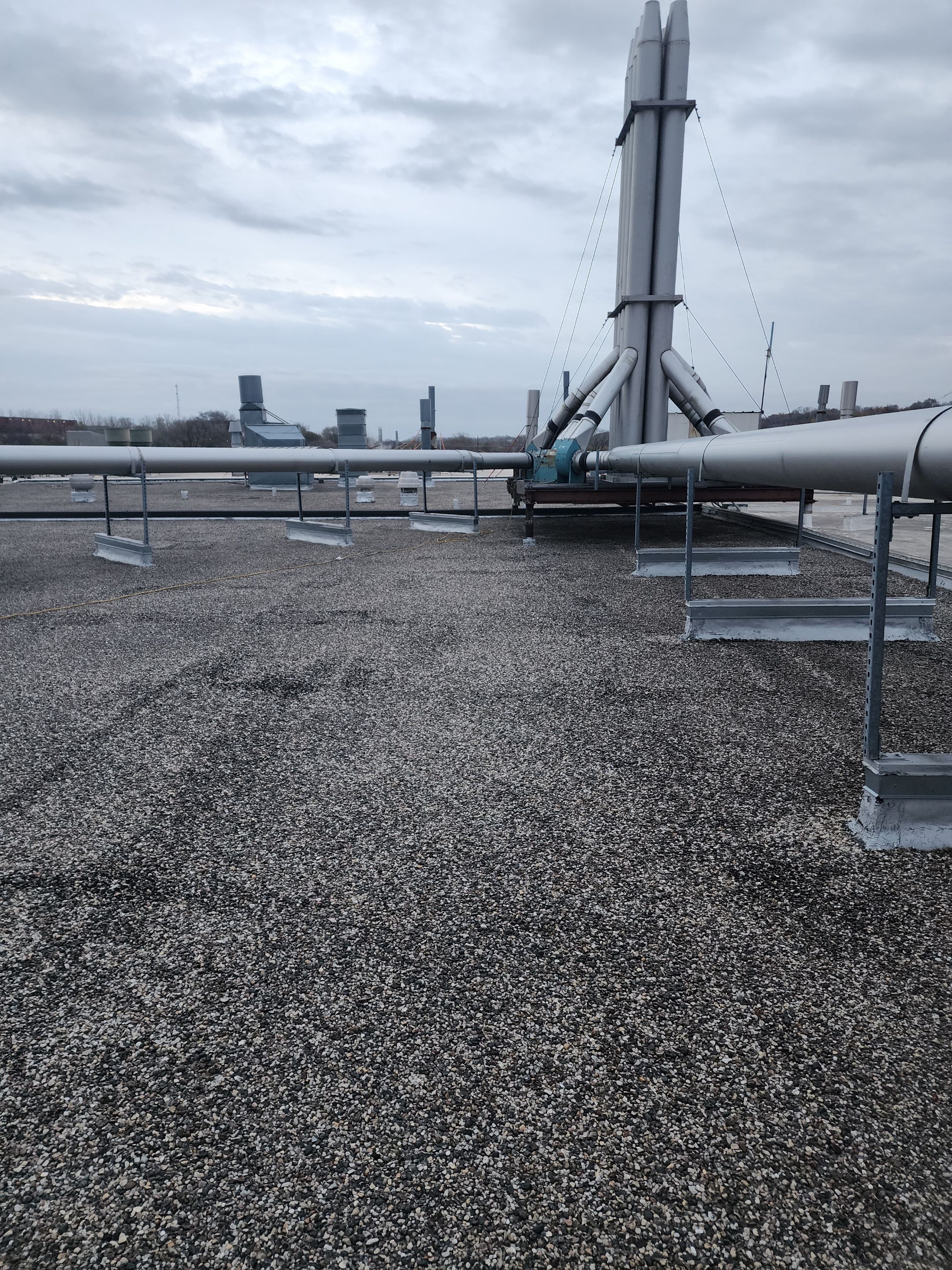 AML Riverside  by Grell Roofing, LLC