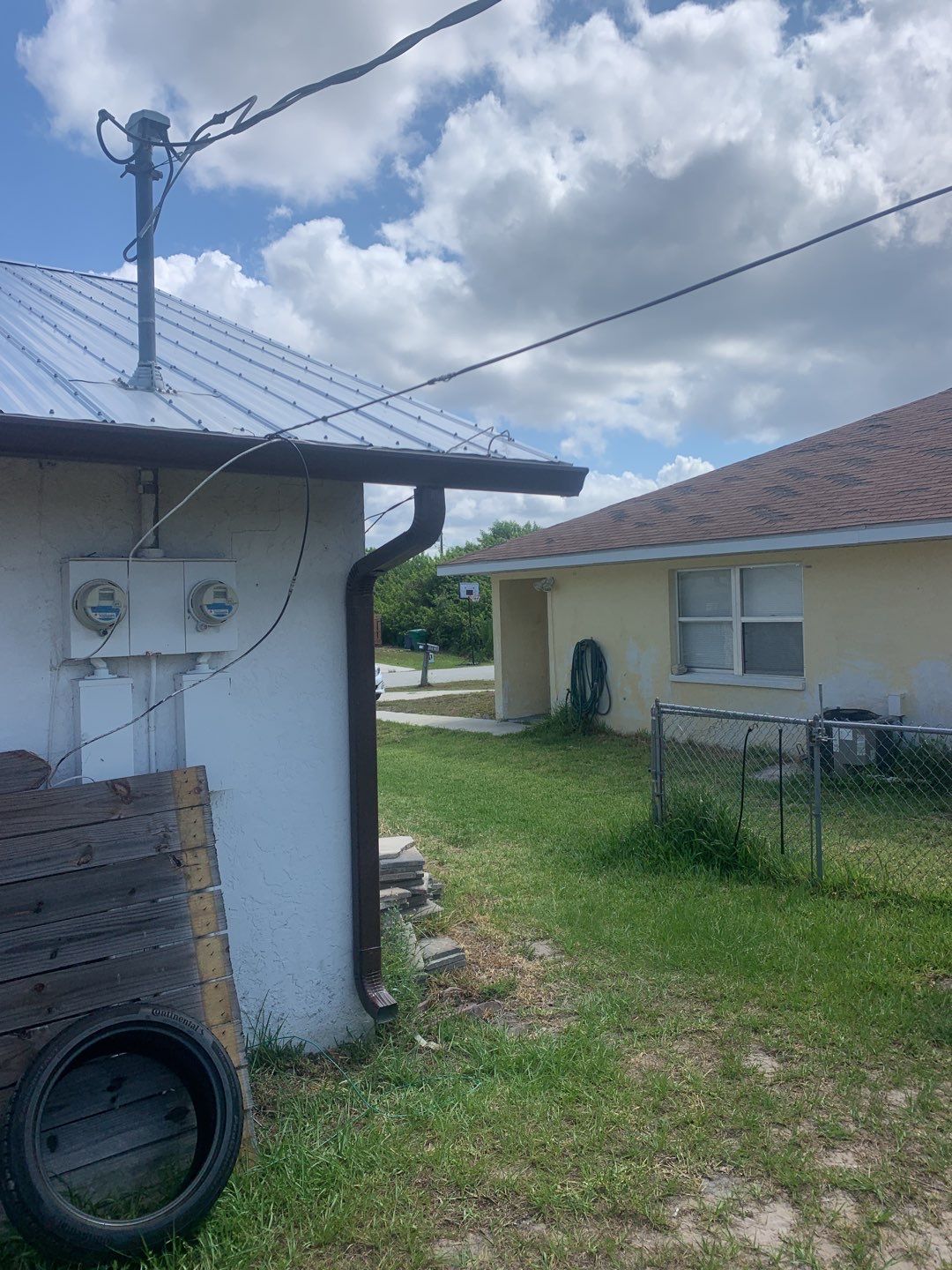 Aluminum Downspouts and Elbows in Englewood FL by Gutter Professors