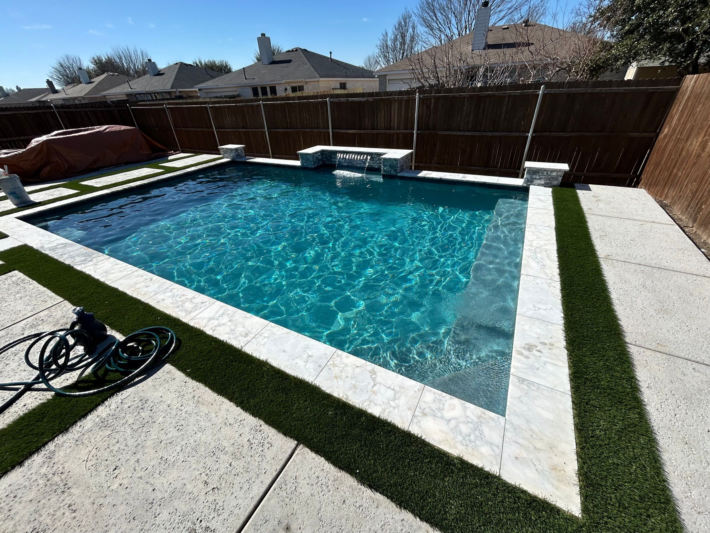 Geometric Pool with Raised Water Feature Wall and Turf by Pinnacle Pools and Spas - DFW