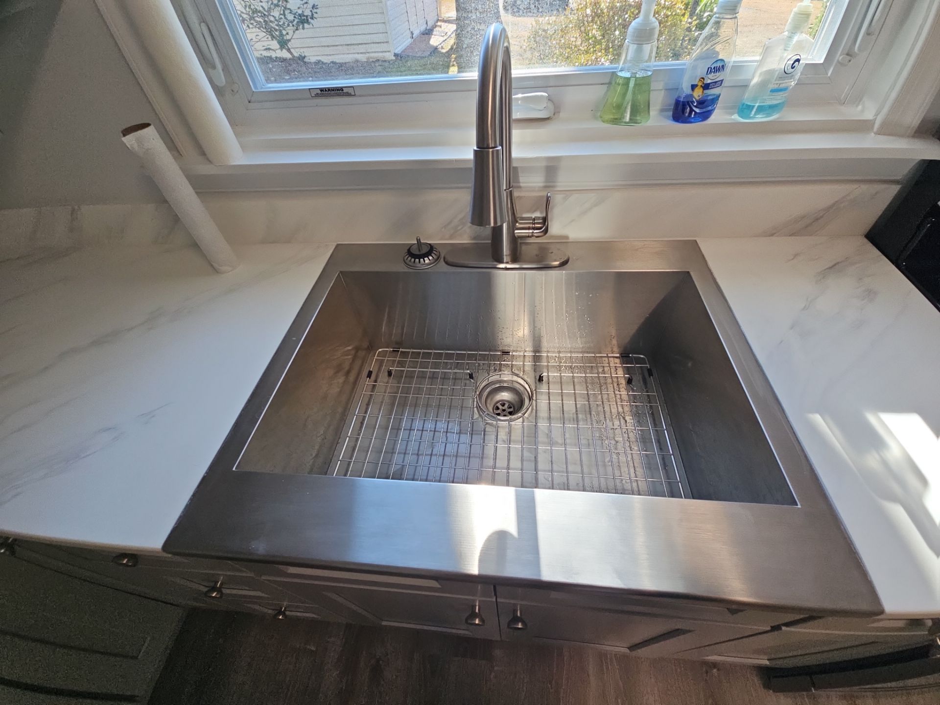 Kitchen and living area remodel by Window Depot of Annapolis