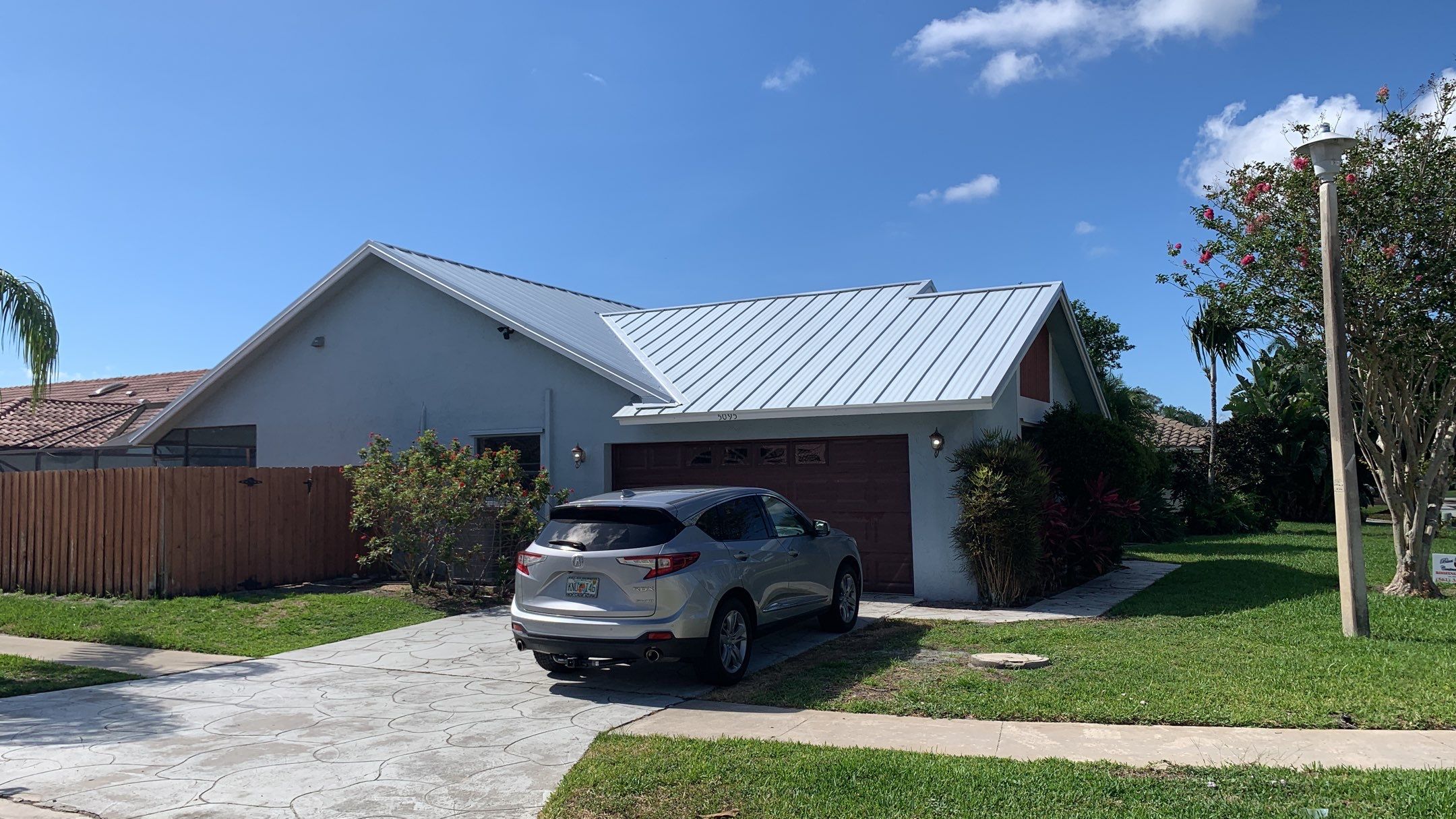 Residential Roofing Installation using 1" Nail strip metal roof by BLUES BROTHERS ROOFING