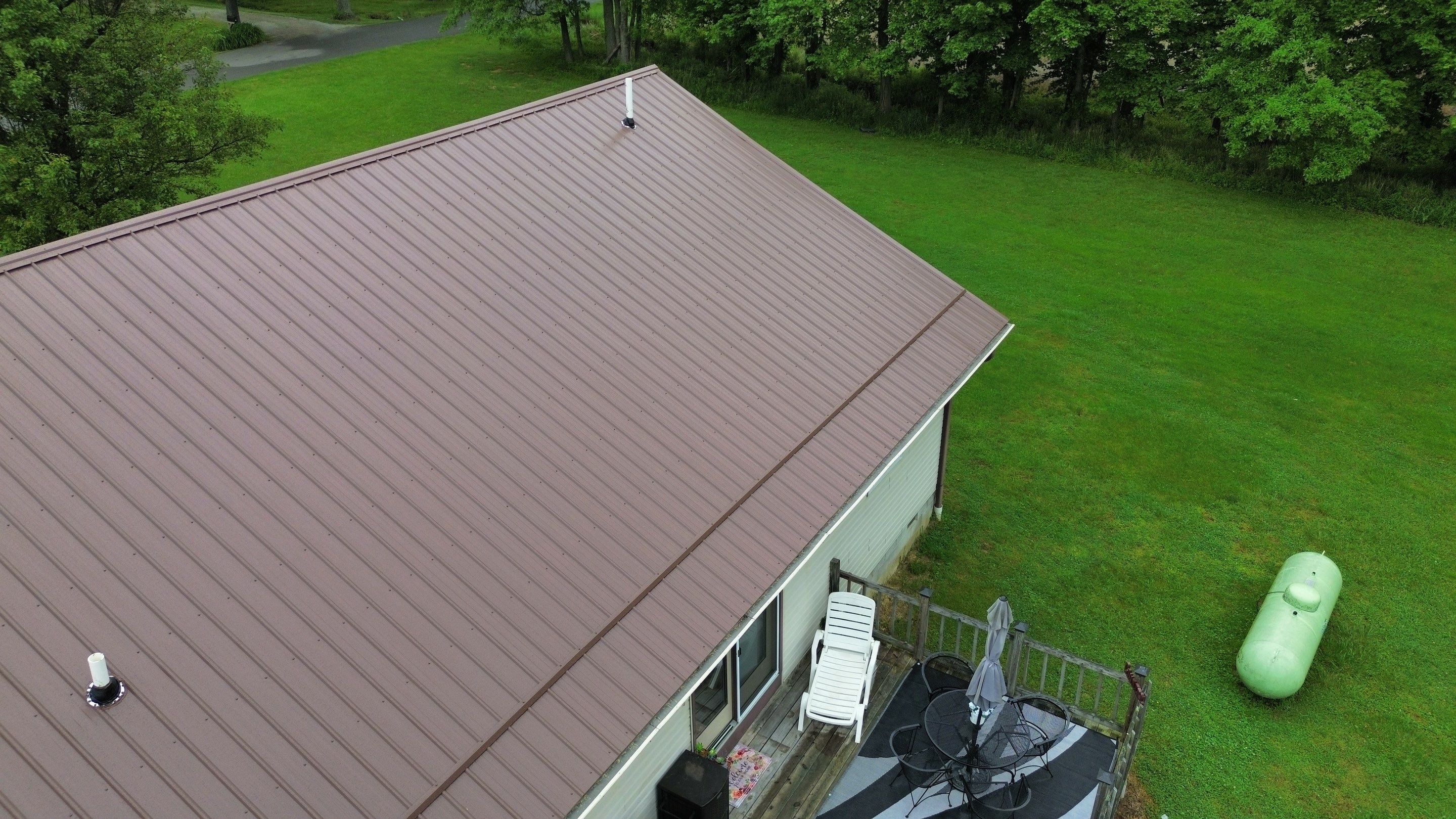 Residential Roofing Installation using Performance Panel Metal - Coca Brown by RoofX 