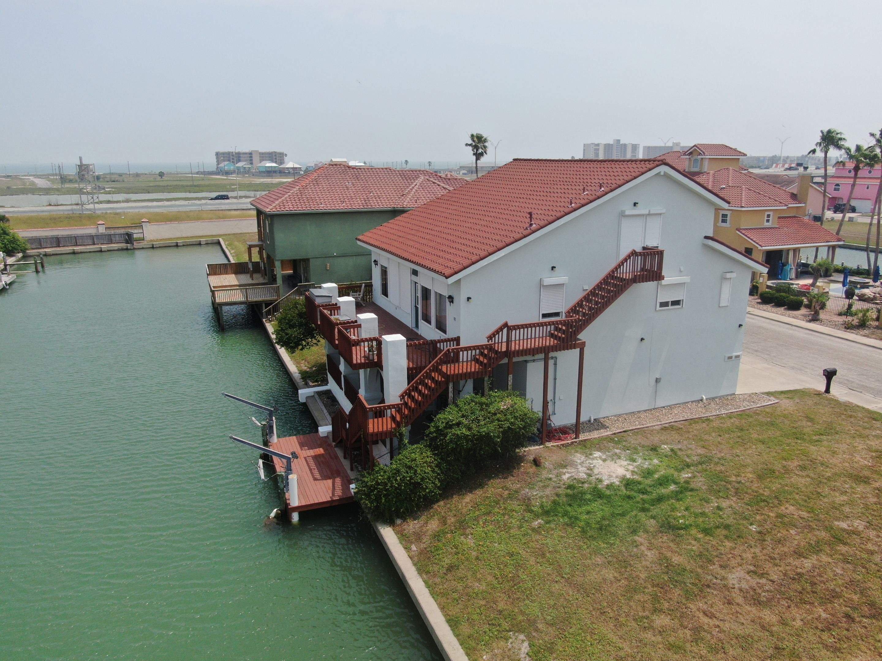 Waterfront Stucco Remastered by Bayfront Roofing and Construction