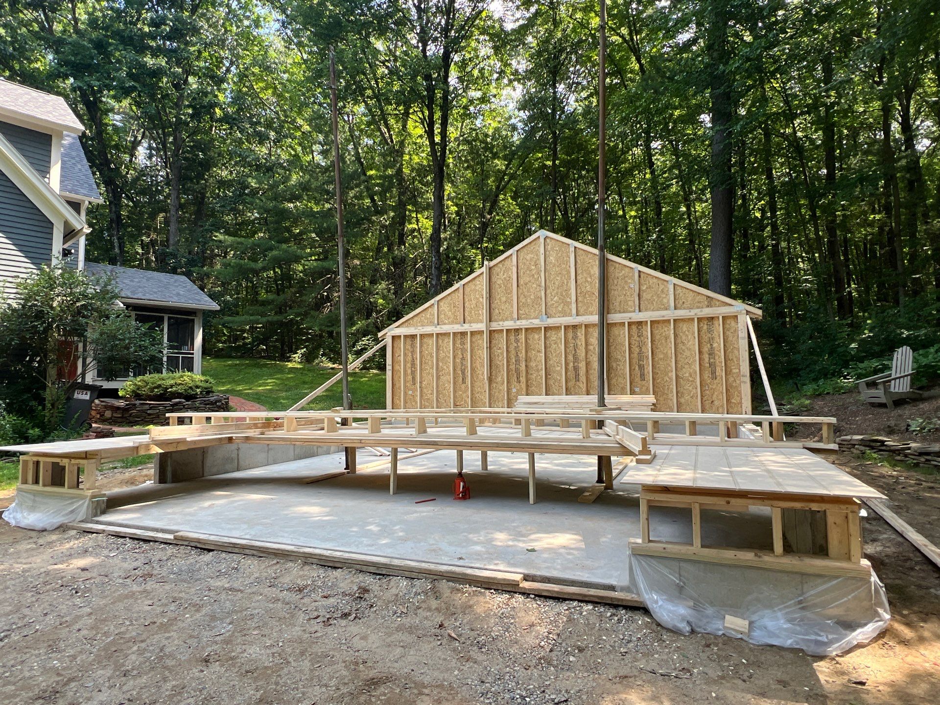 Garage using LP SmartSide Panel Siding by Chagnon Building & Remodeling LLC