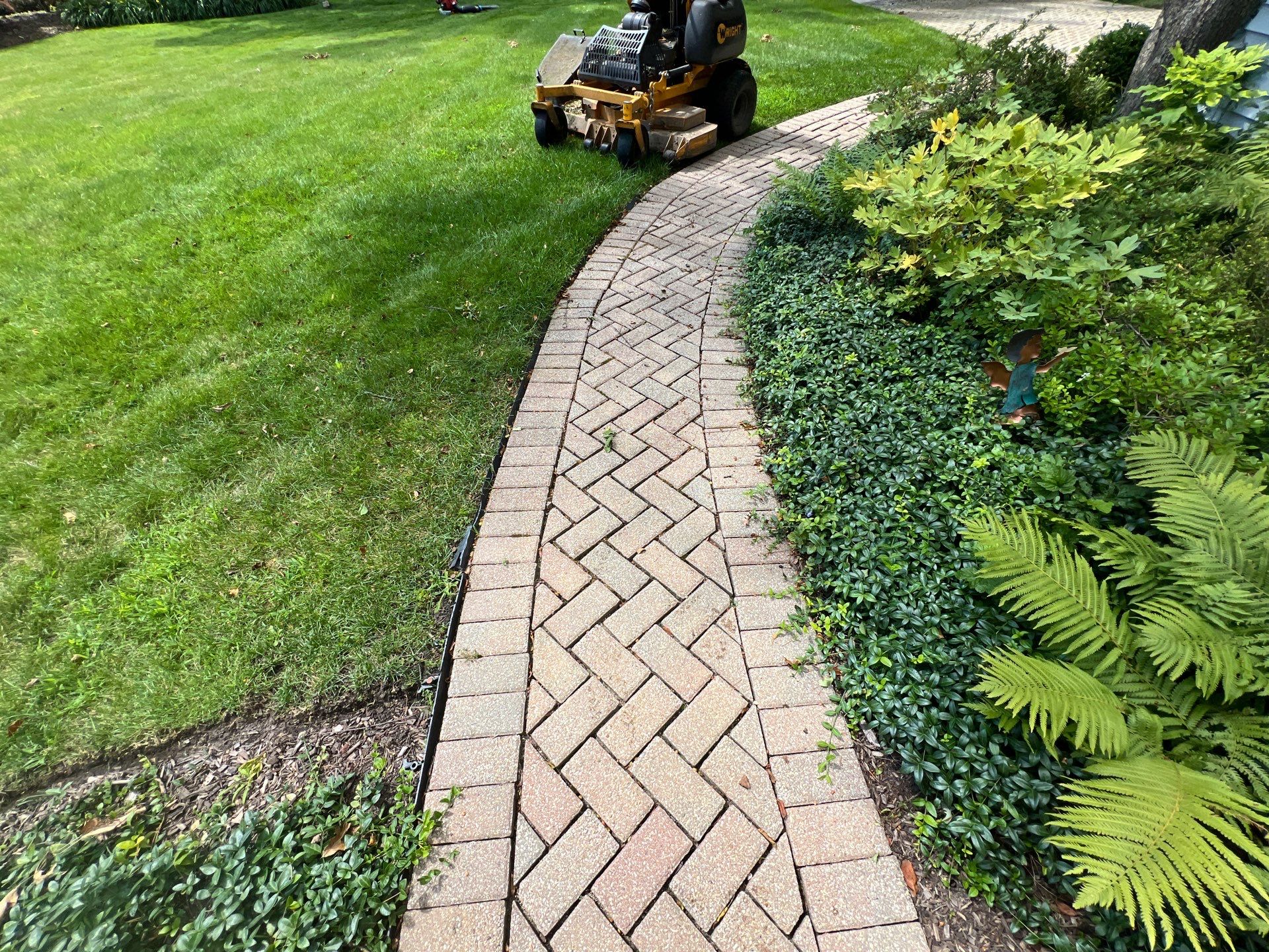 Brick paver clean, sand and seal.  using Polysweep polymeric sand by Northern Power Washing LLC.