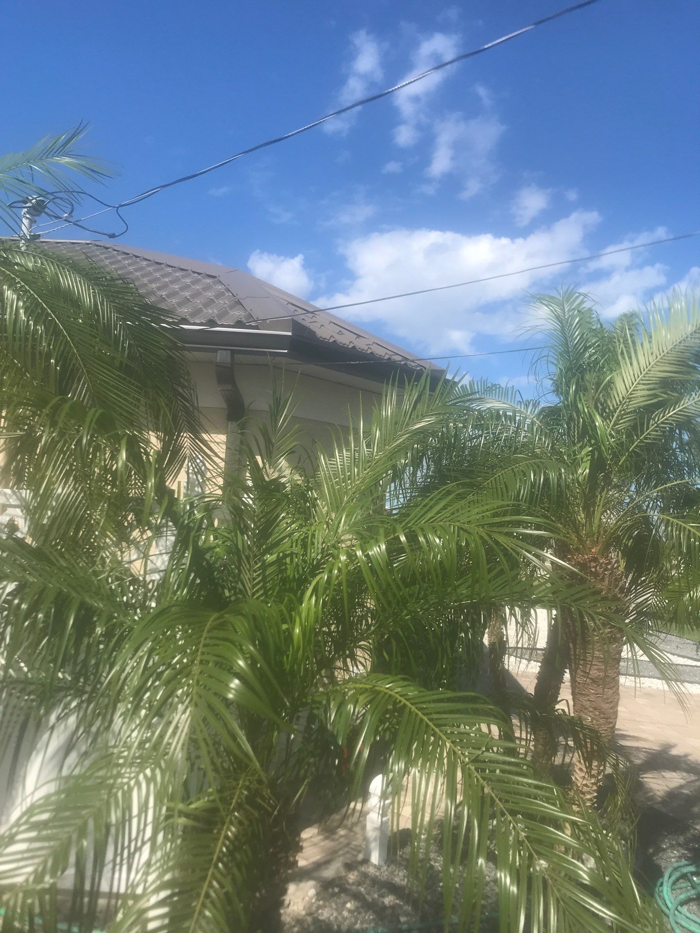 Brown Seamless Gutters Installation in Cape Coral FL by Gutter Professors