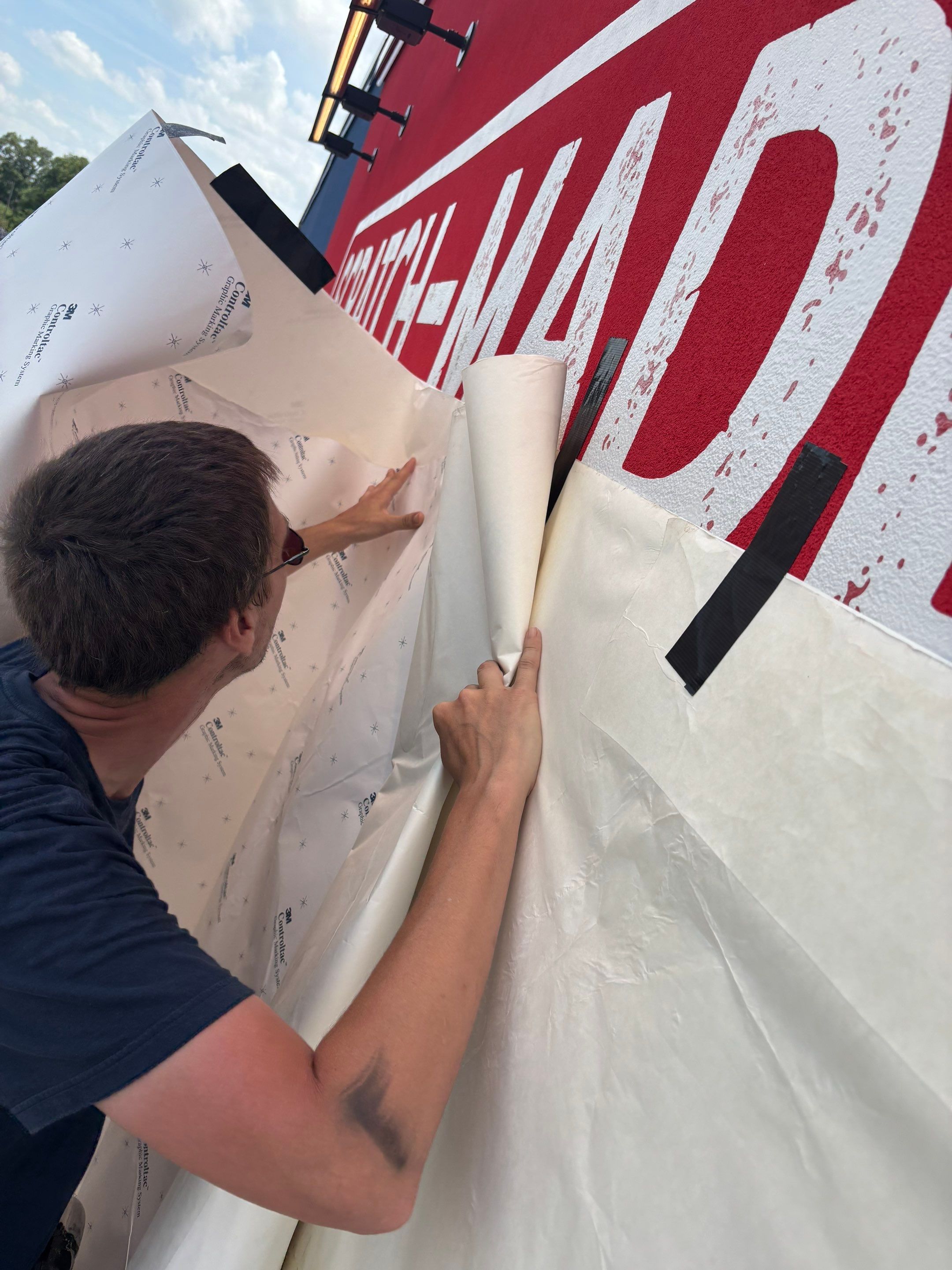 Bubba's 33 Exterior Vinyl Graphic and Painted Signage Installation by Hayes Design co