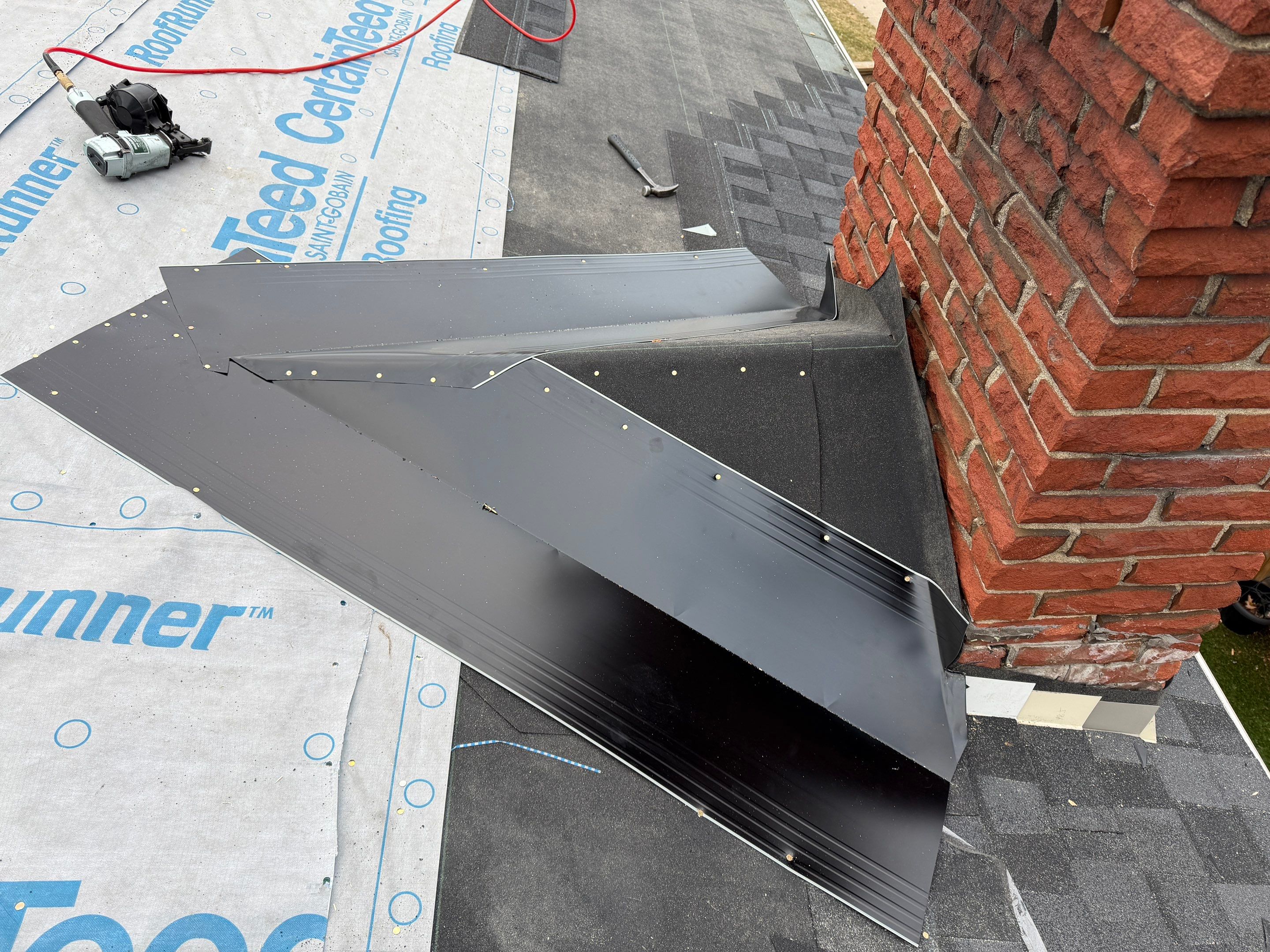 Project in Burlington by The Roofing Crew