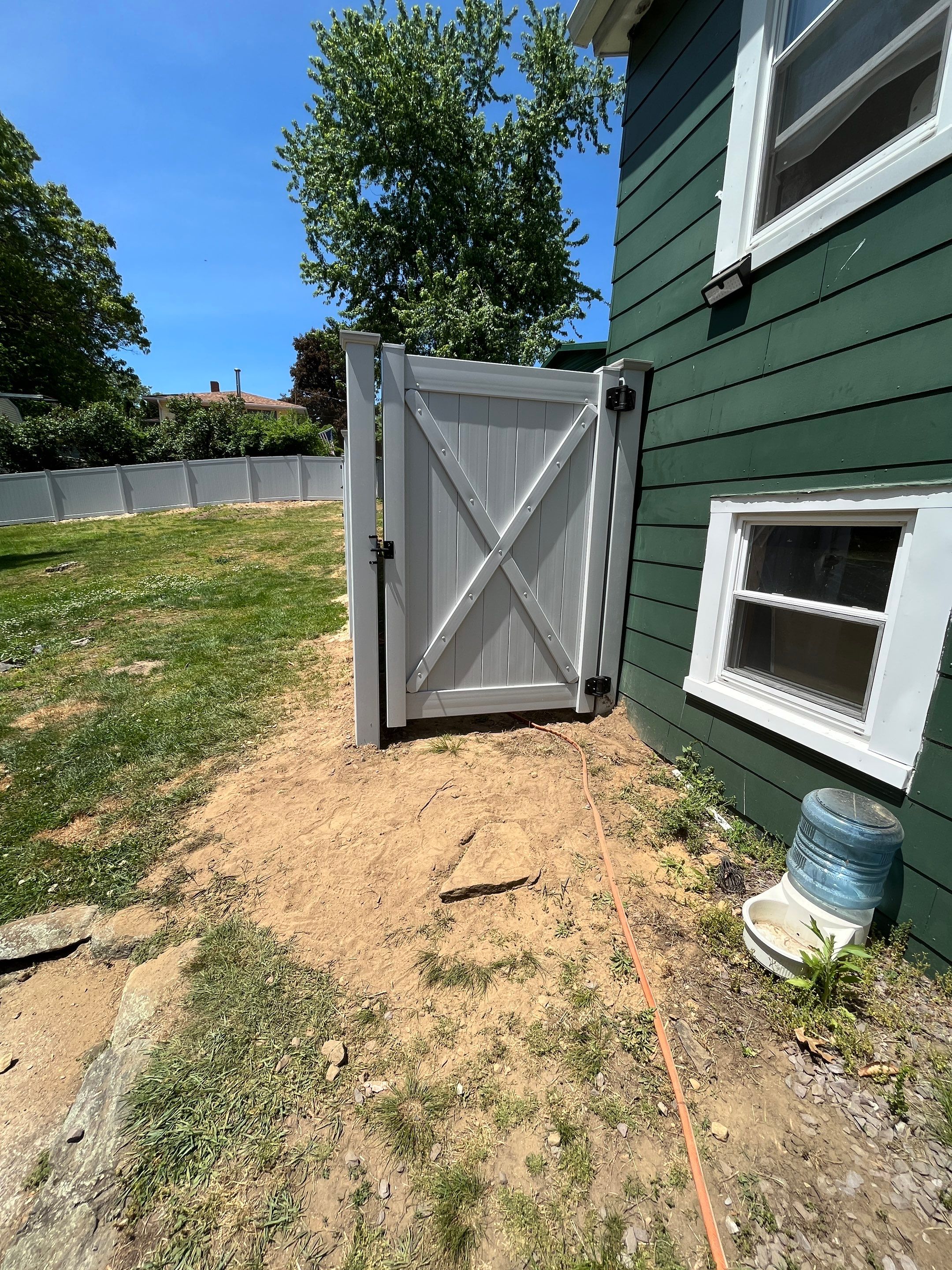 New Vinyl Privacy Fence, With Matching Gate in White. by DiGiorgi Roofing and Siding Inc