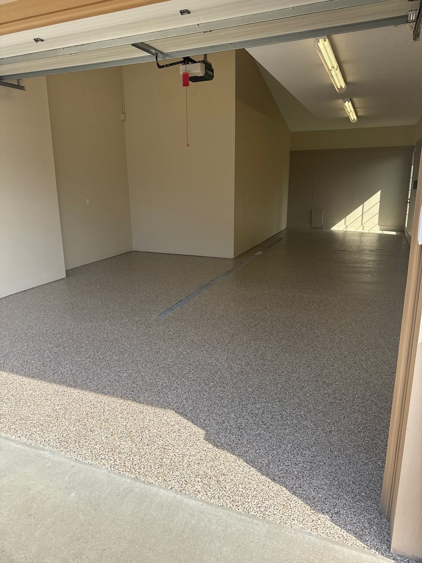 Basement Flake Floor Coating Installation in Johnston by Revival Concrete Coatings
