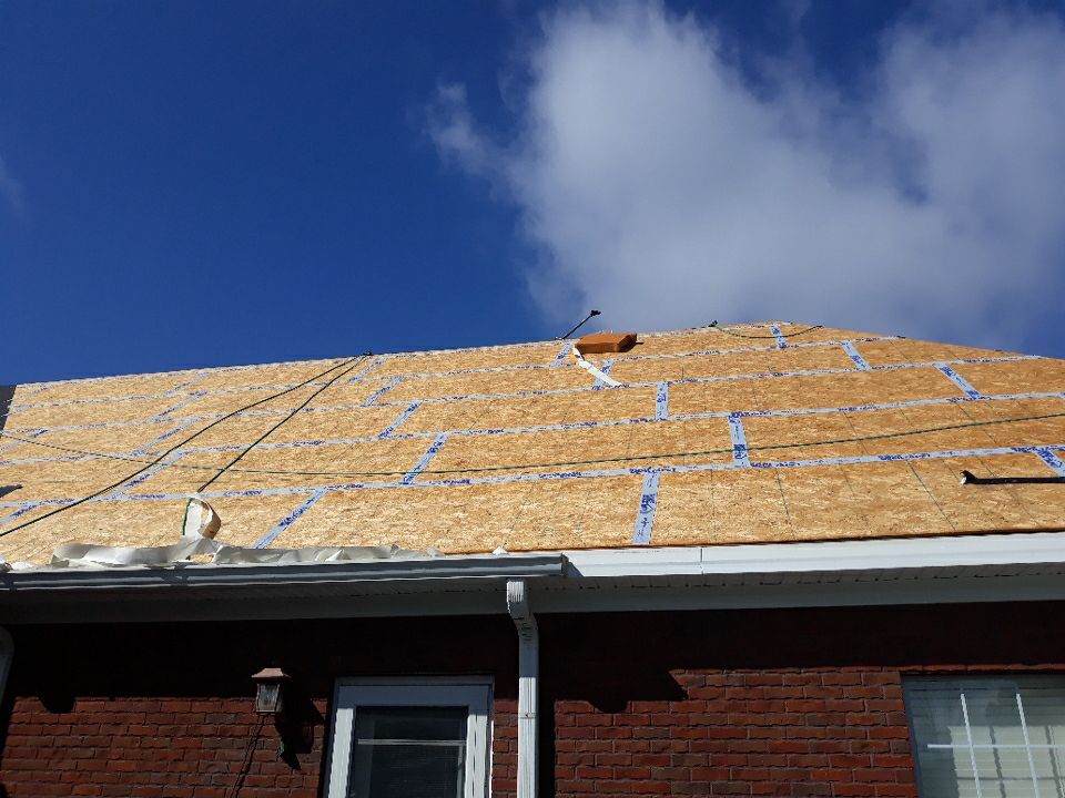 Residential Roofing Installation using Roof Replacement by American Roofing & Construction LLC