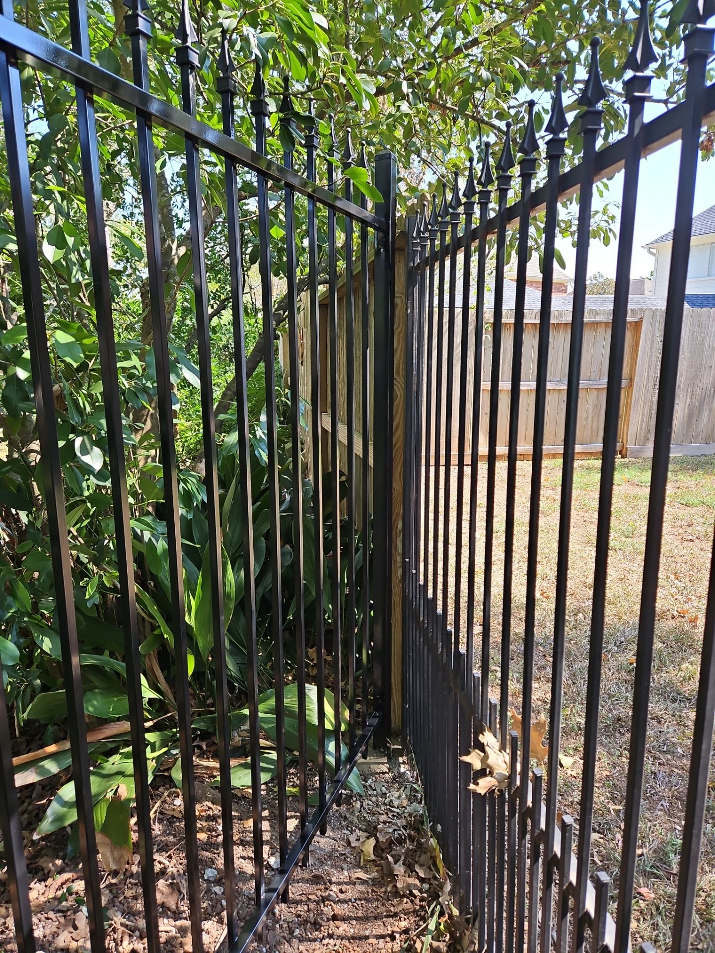 Iron fence installation using LION iron panel - 2 Rail, 6ft Tall by Tim's Fences