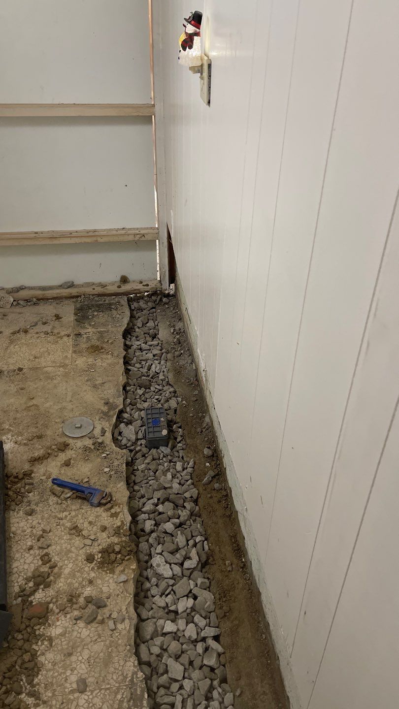 Interior Waterproofing Using GrateDrain™ Products by Toledo Basement Repair 