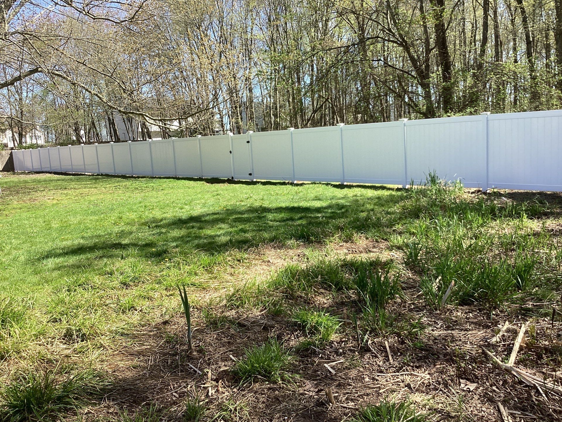 New White Vinyl privacy fence with matching gates  by DiGiorgi Roofing and Siding Inc