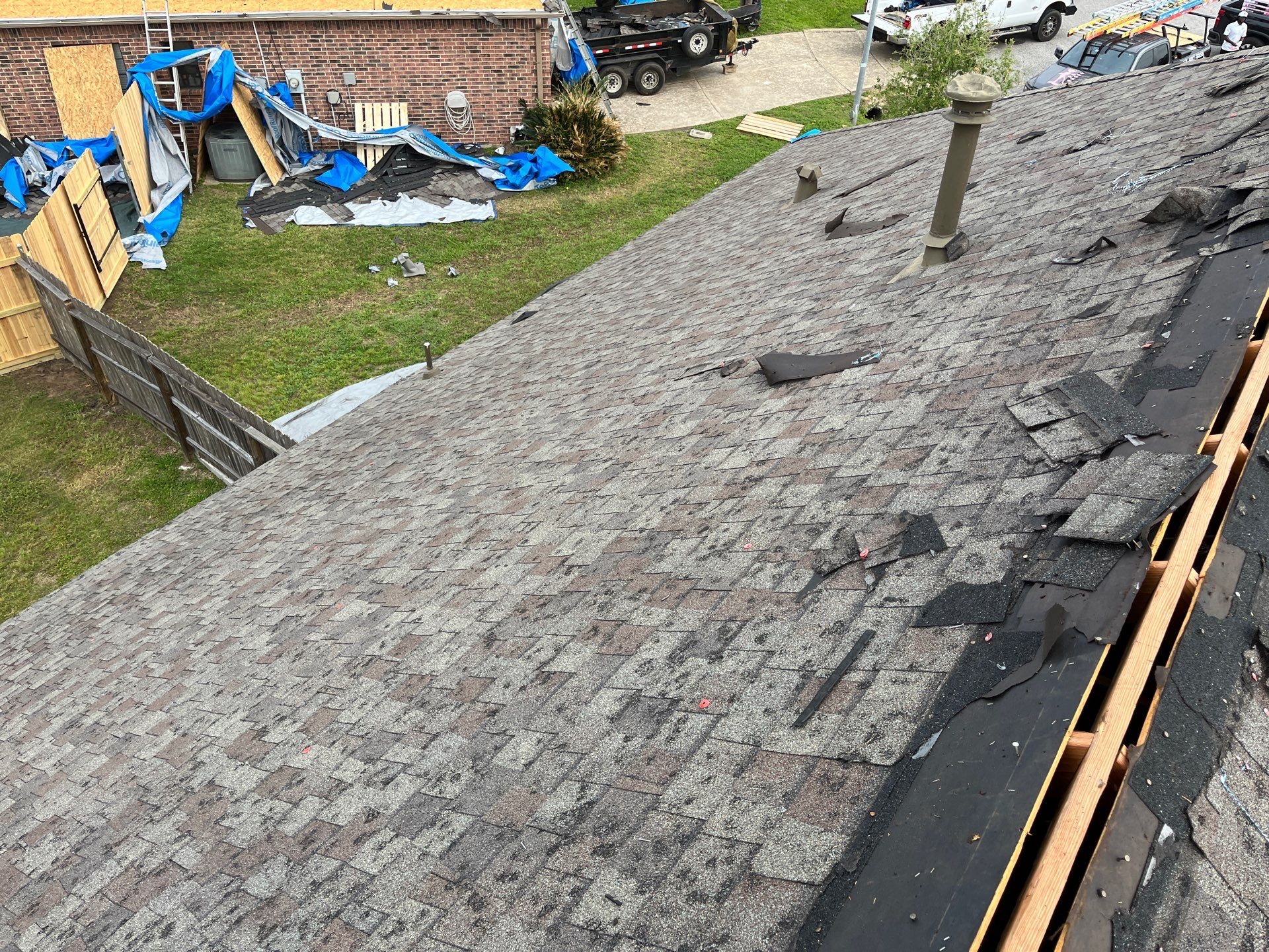 Hail Damage using Owen's Corning Duration (Lifetime) Shingles by Roof Repair Company