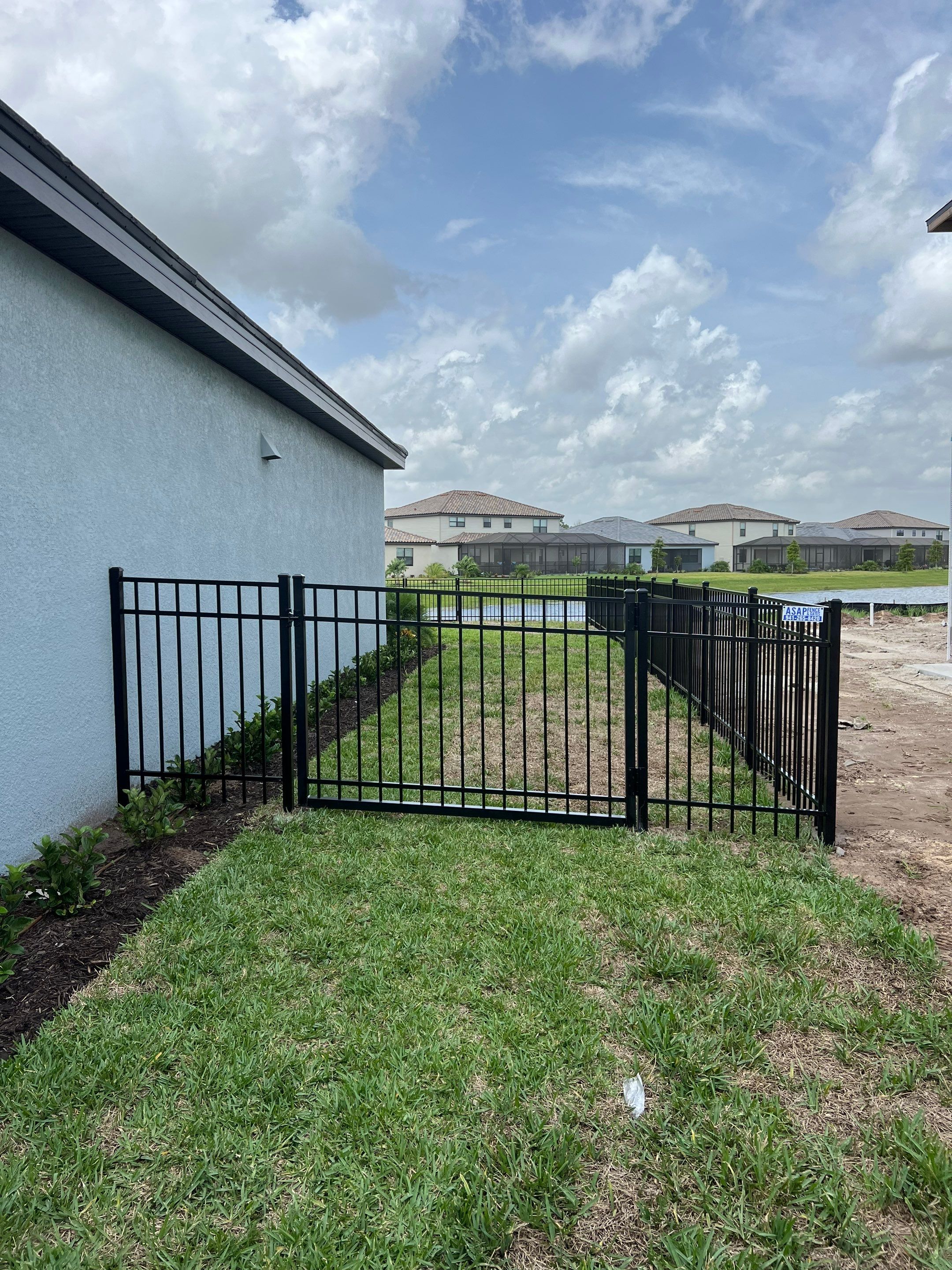 Aluminum Fence Installation using Black 3 Rail Aluminum Fence by Asap fence and gates, LLC