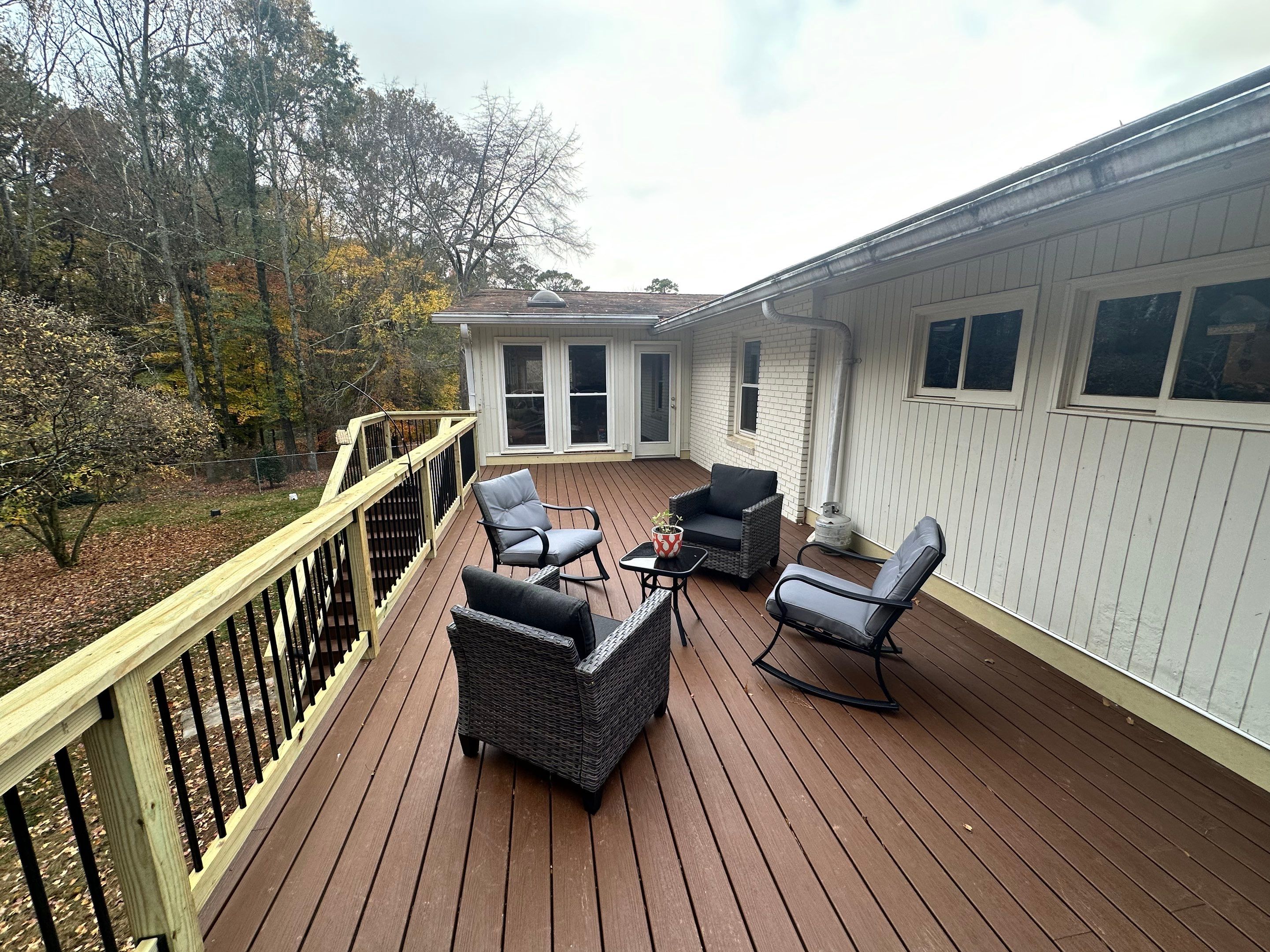 Elevated Composite Deck Rebuild With Metal Balusters in Marietta by Swift Home Renovations