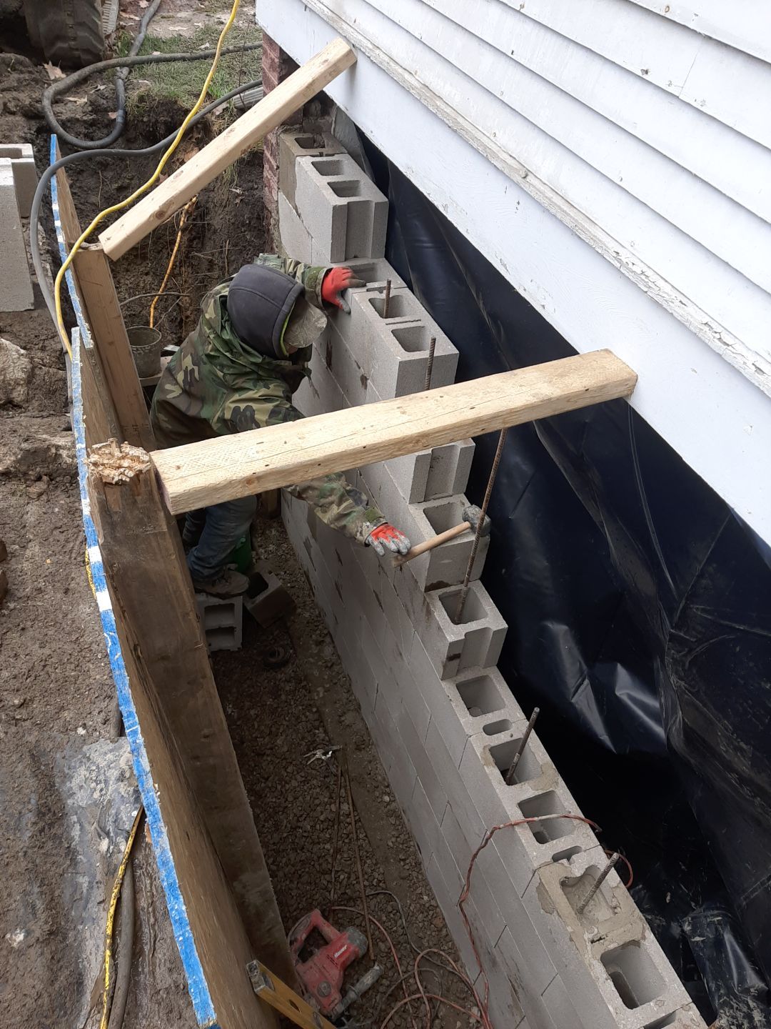 Basement Wall Rebuild with Exterior Waterproofing by Toledo Basement Repair