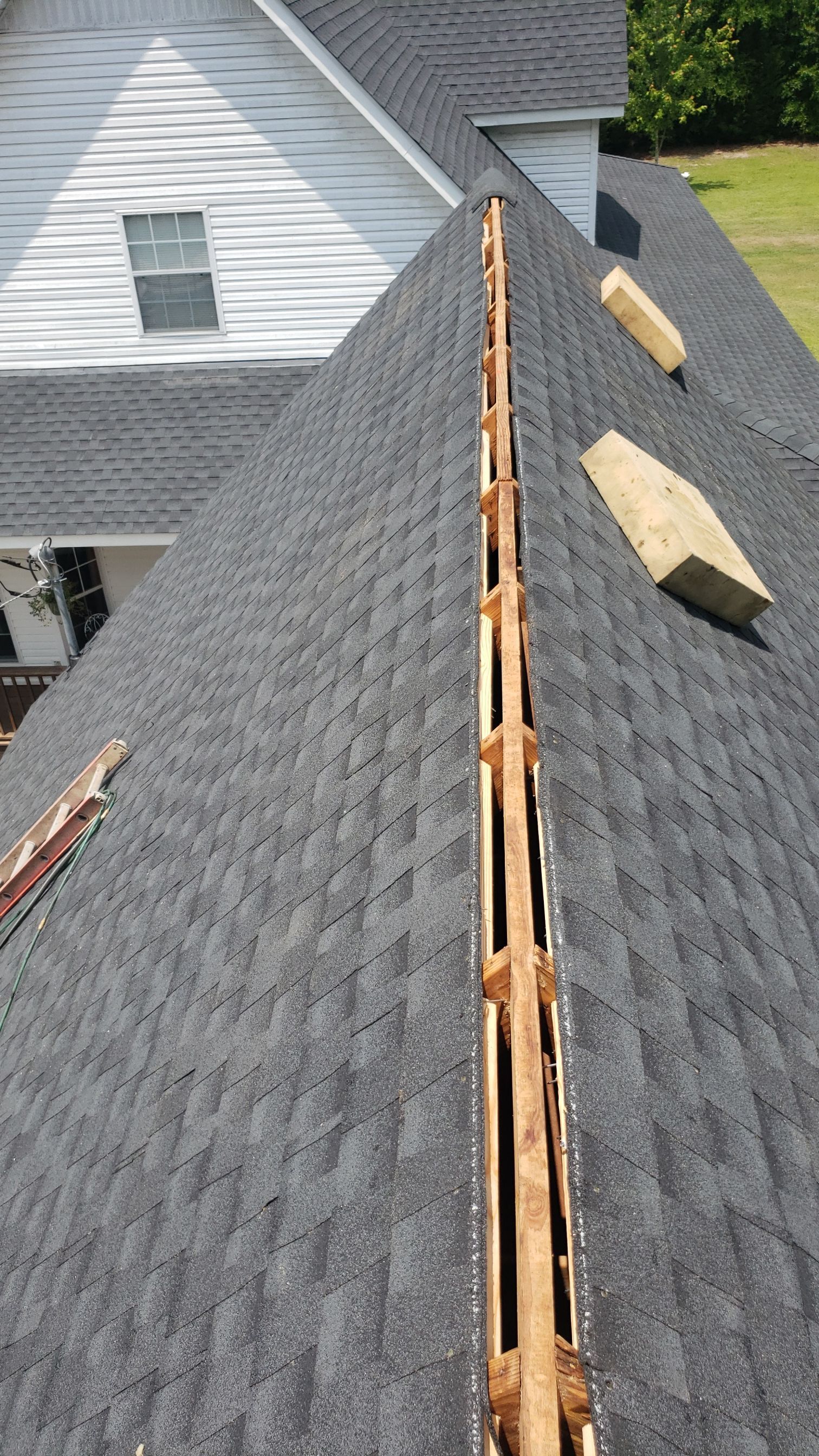 Residential Roofing Installation using Roof Replacement by American Roofing & Construction LLC