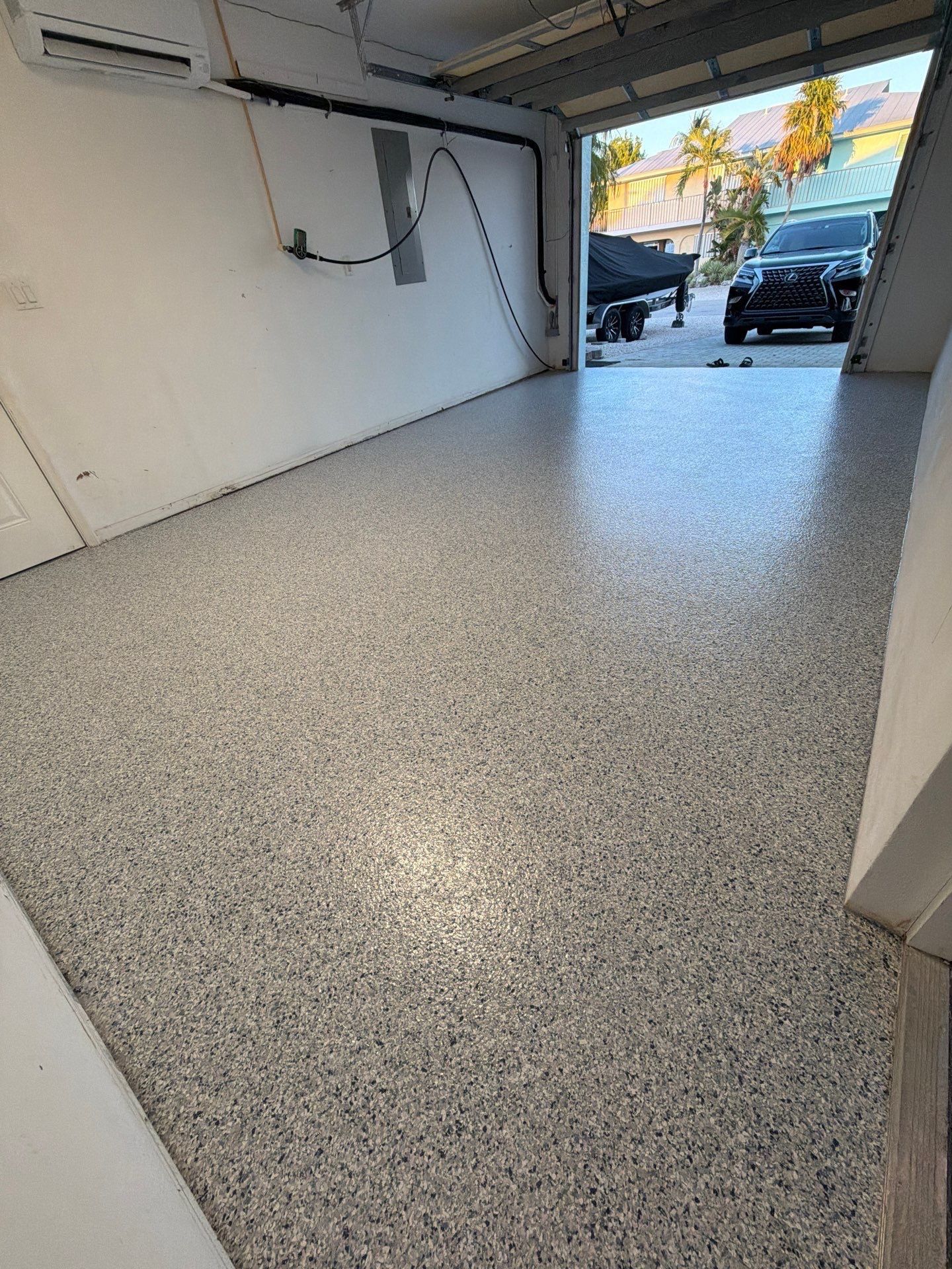 “Tidal Wave” Garage Floor in Key Colony Beach, FL by Tropical Epoxy Coatings & Creations LLC 