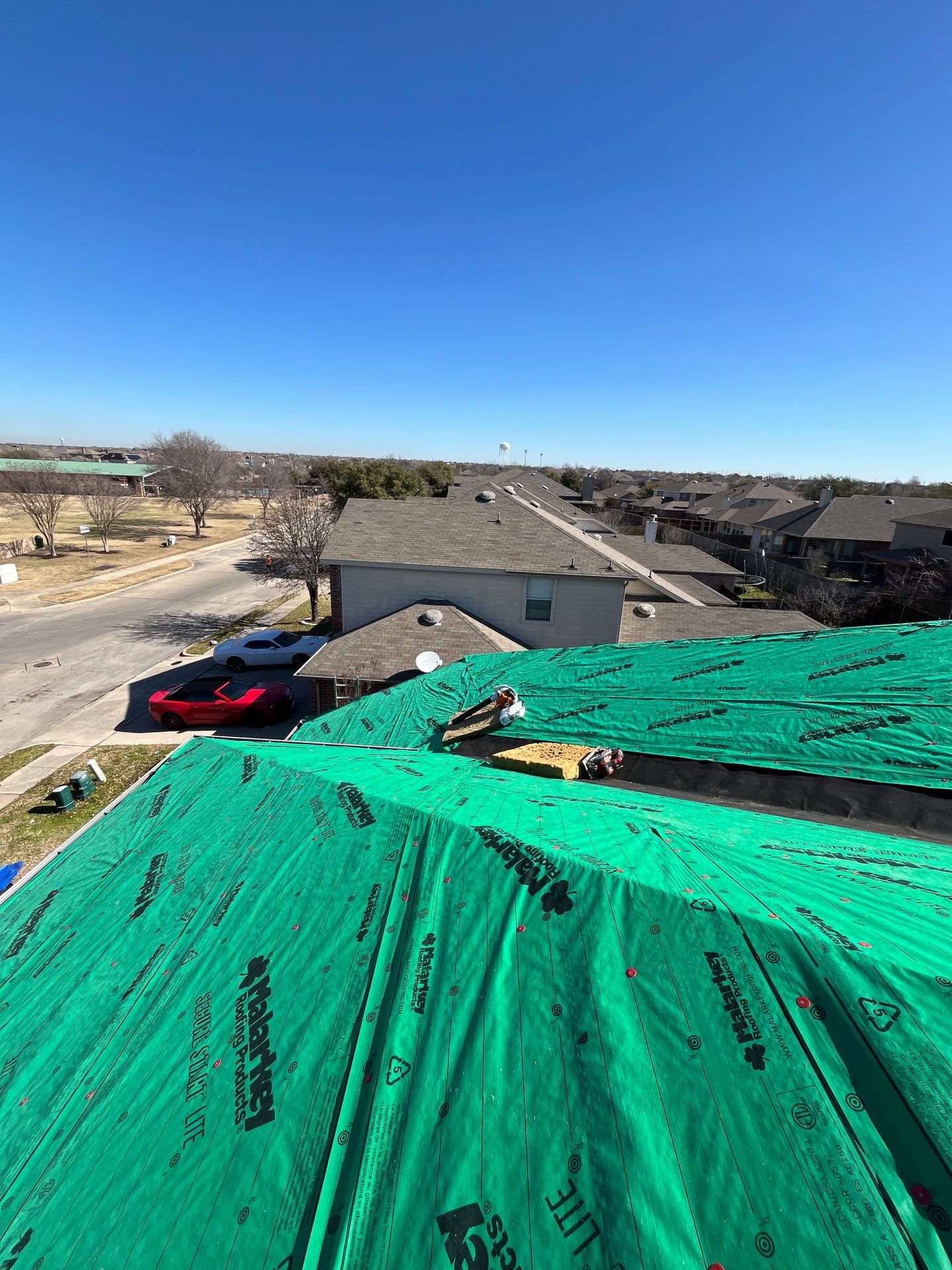 Reroof and Gutters by Berry Good Roofing 