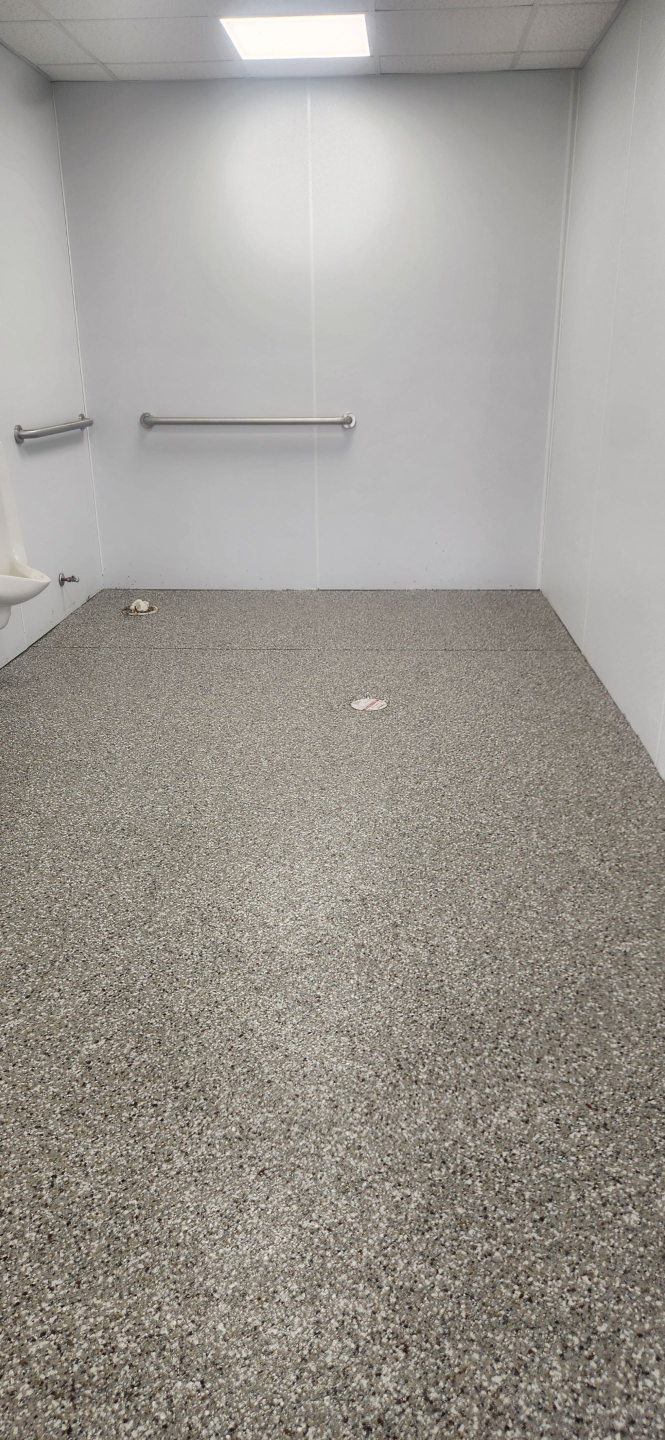 Church Storage Room & Bathroom Using Creekbed by Elite Floor Solutions