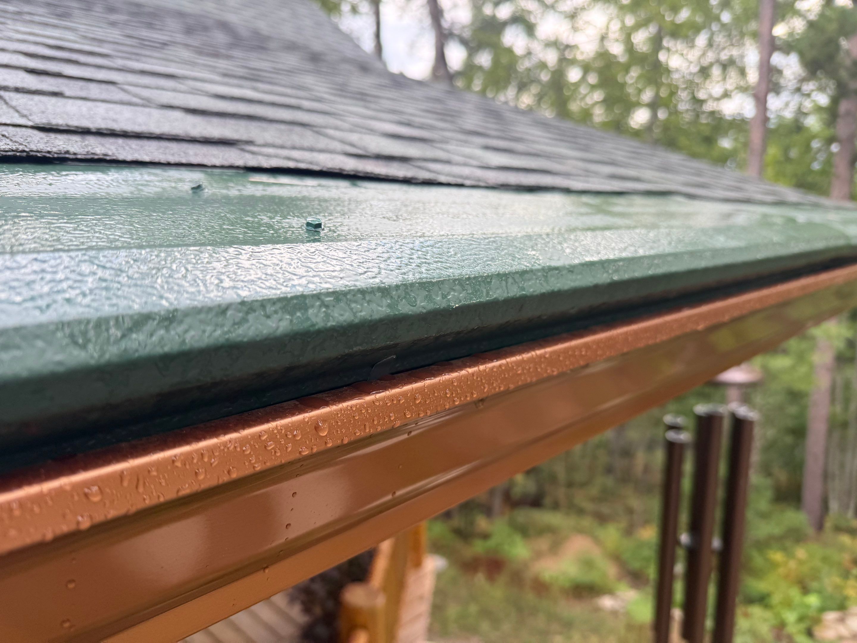 Copper Gutter and Gutter Helmet Installation on Williamsburg Log Cabin