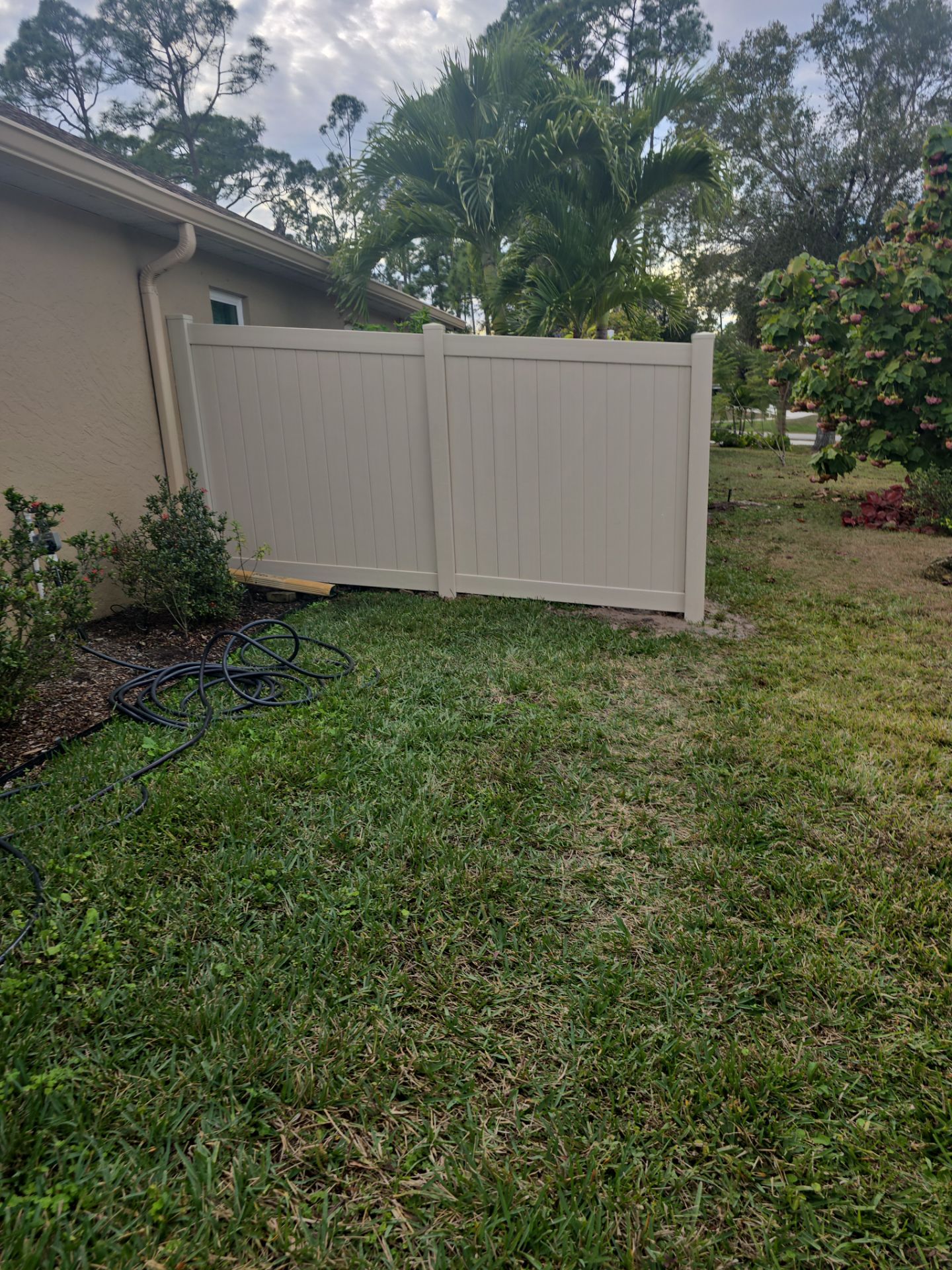 Tan Vinyl Fence in North Port by True Fence LLC