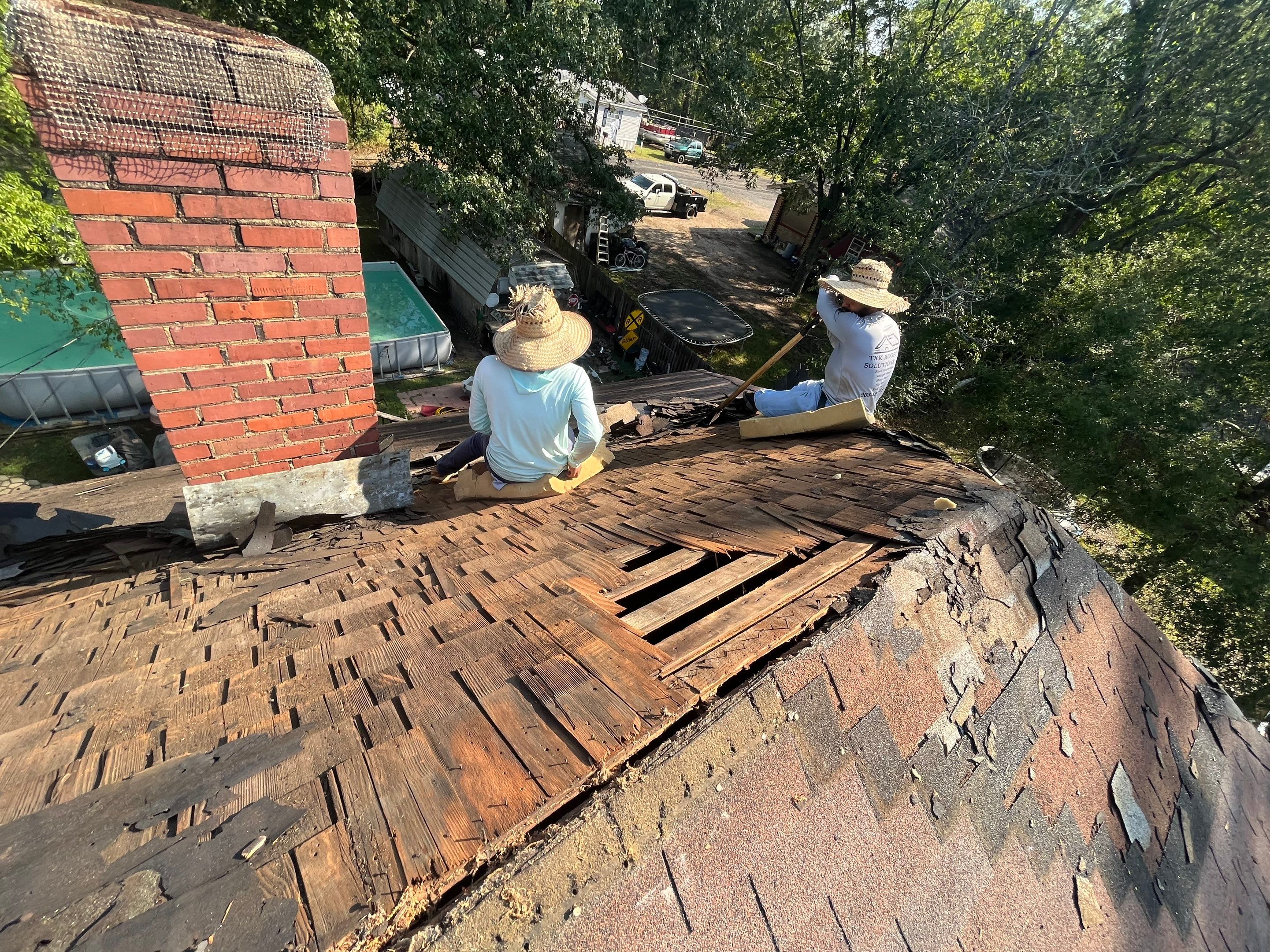 Residential Metal Roof Replacement using Reed's Metals: Colored Residental Panel (Burgundy) by Hostetler Roofing