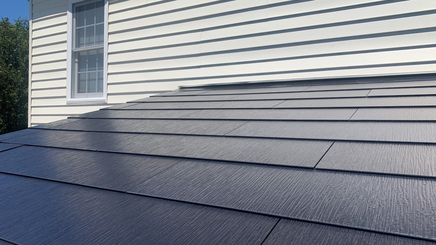Tesla Solar Roof Replacement using Tesla Solar Roof V3 tiles by American Home Contractors