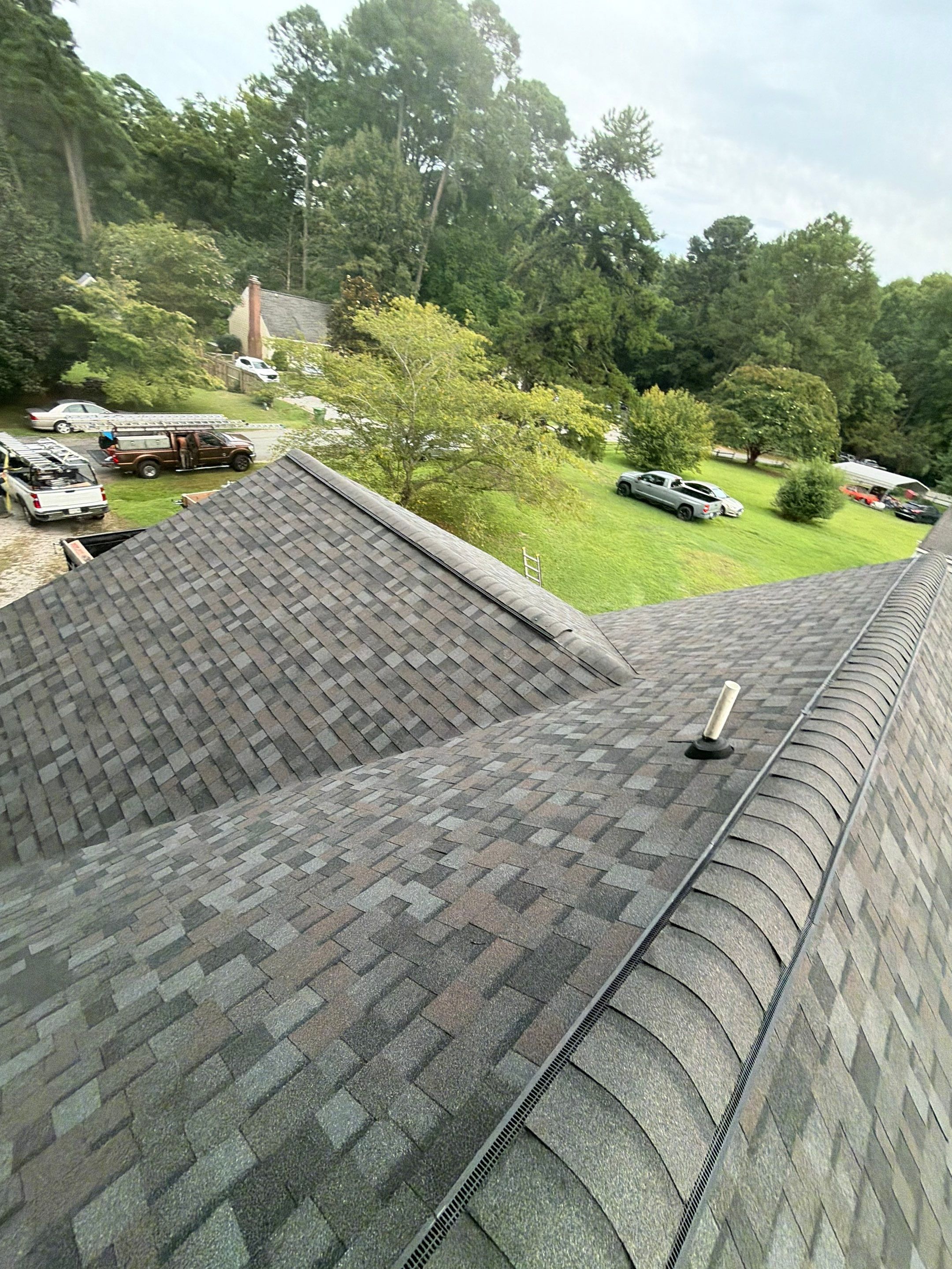 Asphalt Shingle Roof Replacement and Custom Porch Renovation in Hayes by Cade Construction