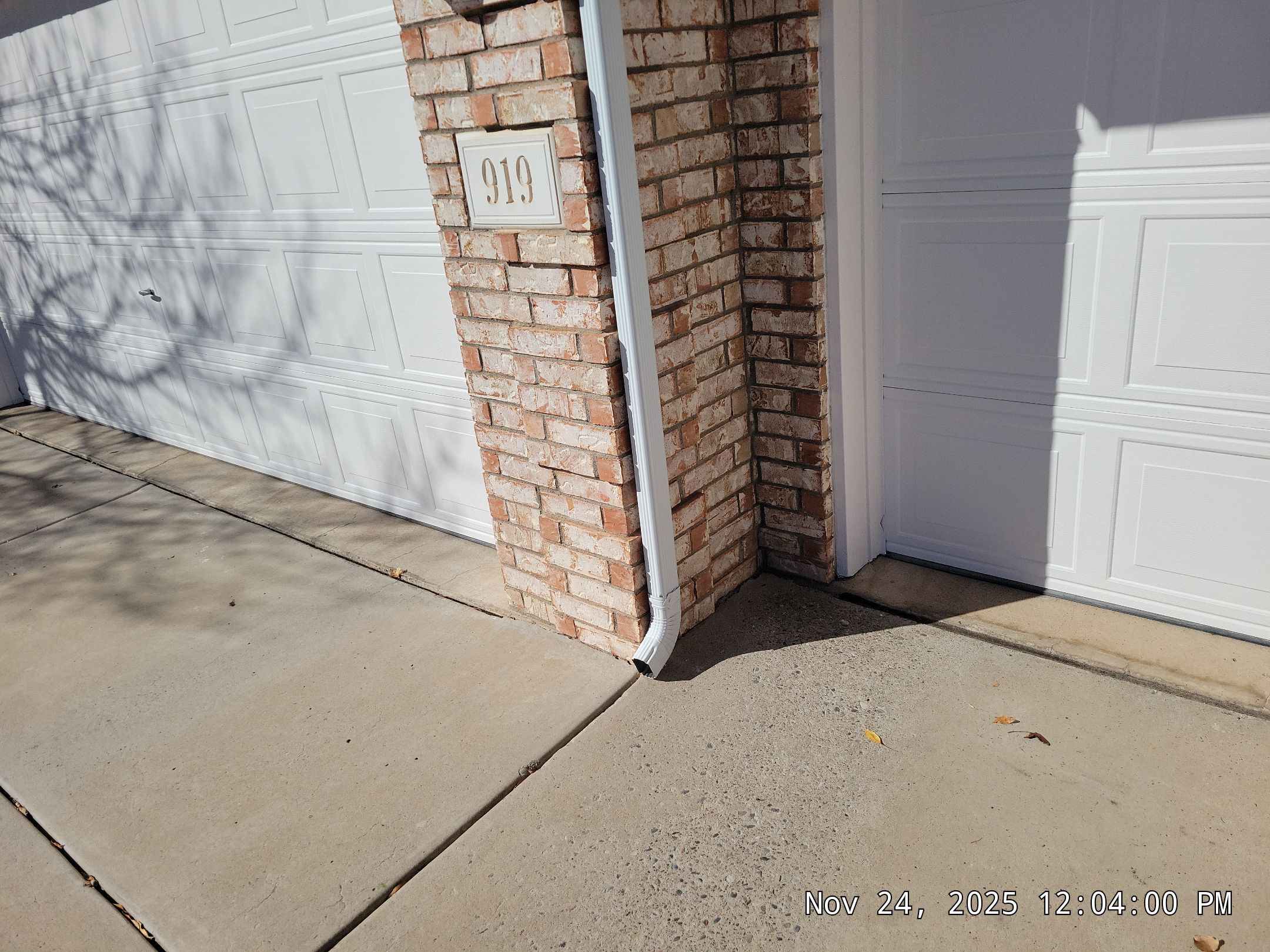 Seamless White Gutter and Downspout Installation in Albuquerque by Doyle Roof Masters Inc