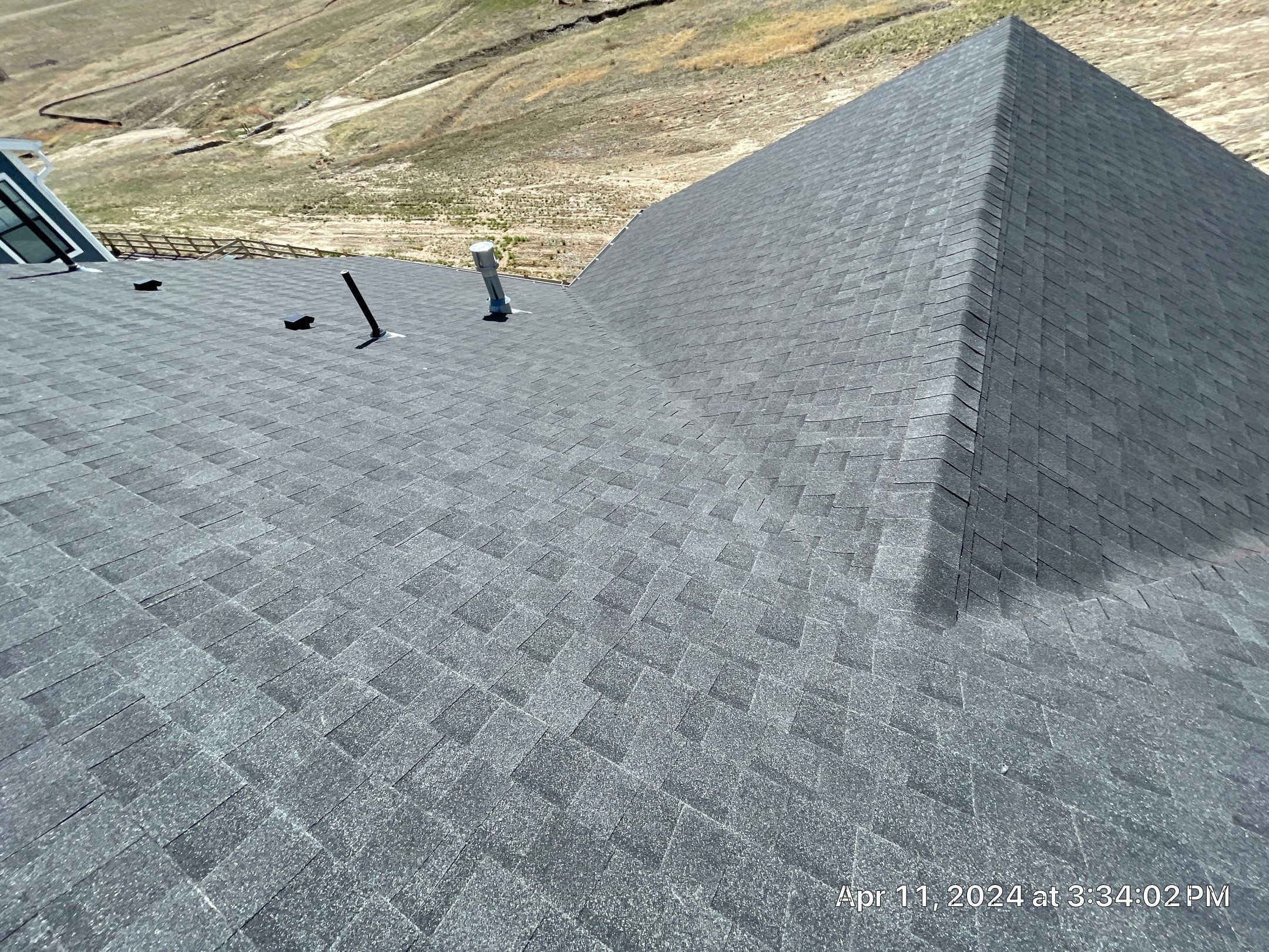 Residential Roofing Installation using Atlas Pinnacle Impact Black Shadow by Blue Peaks Roofing LLC 