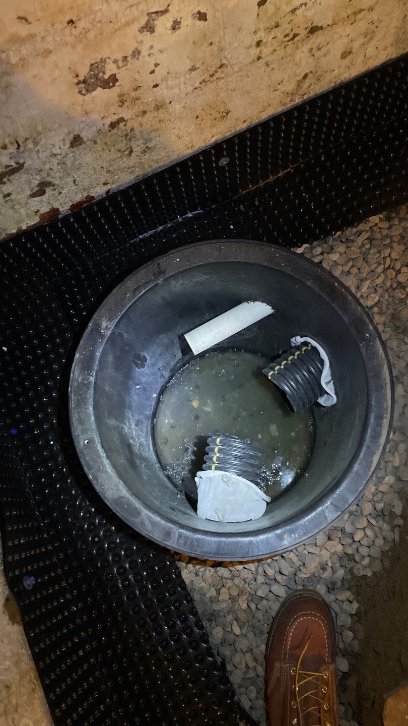Interior Drain Tile & Sump Pump System in North Minneapolis by Waterproofing Northeast