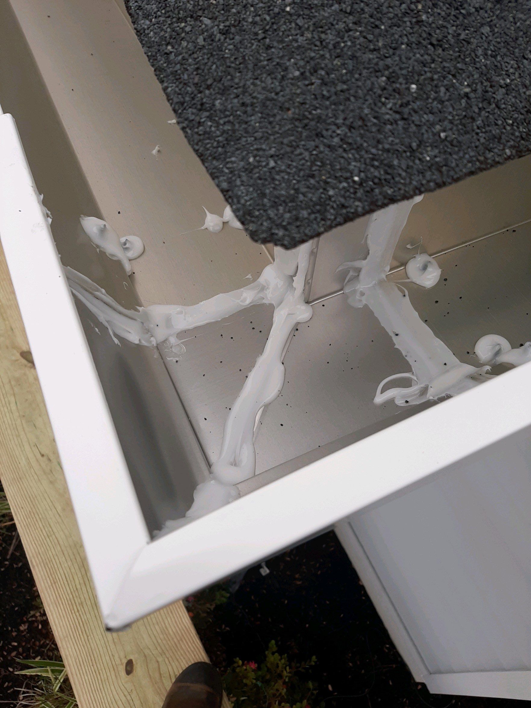 Gutter Installation using White K-Style Seamless Gutters by Gutter Professors