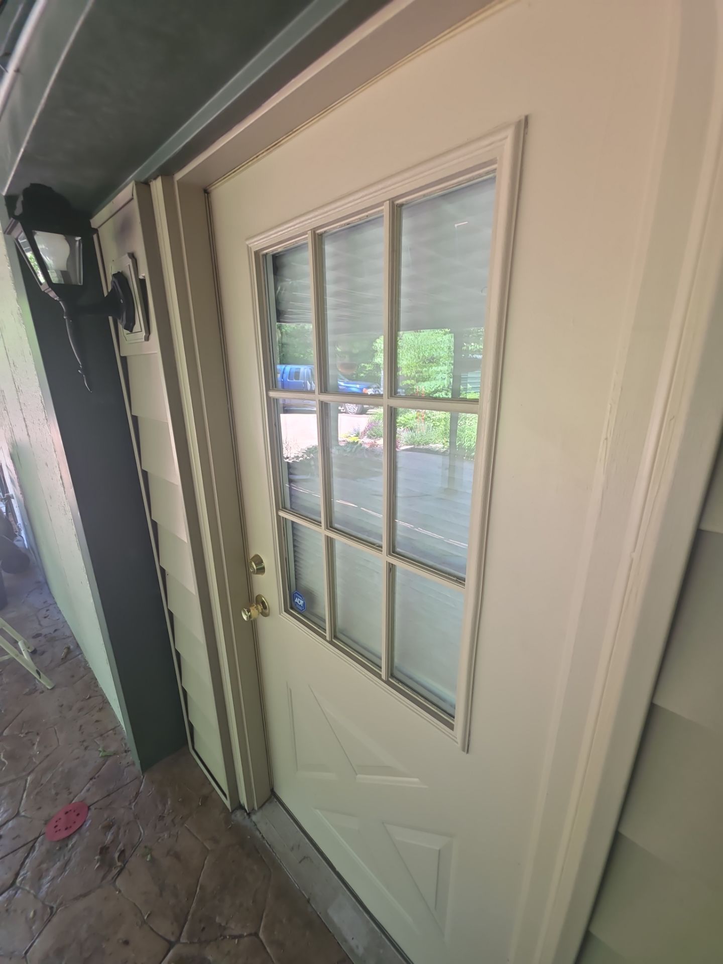 Exterior Entry Door and Garage Door Painting by Legendary Services Company LLC.