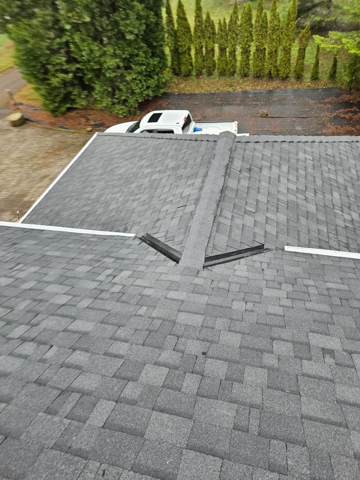 Charcoal Gray Shingles by Reimagine Roofing