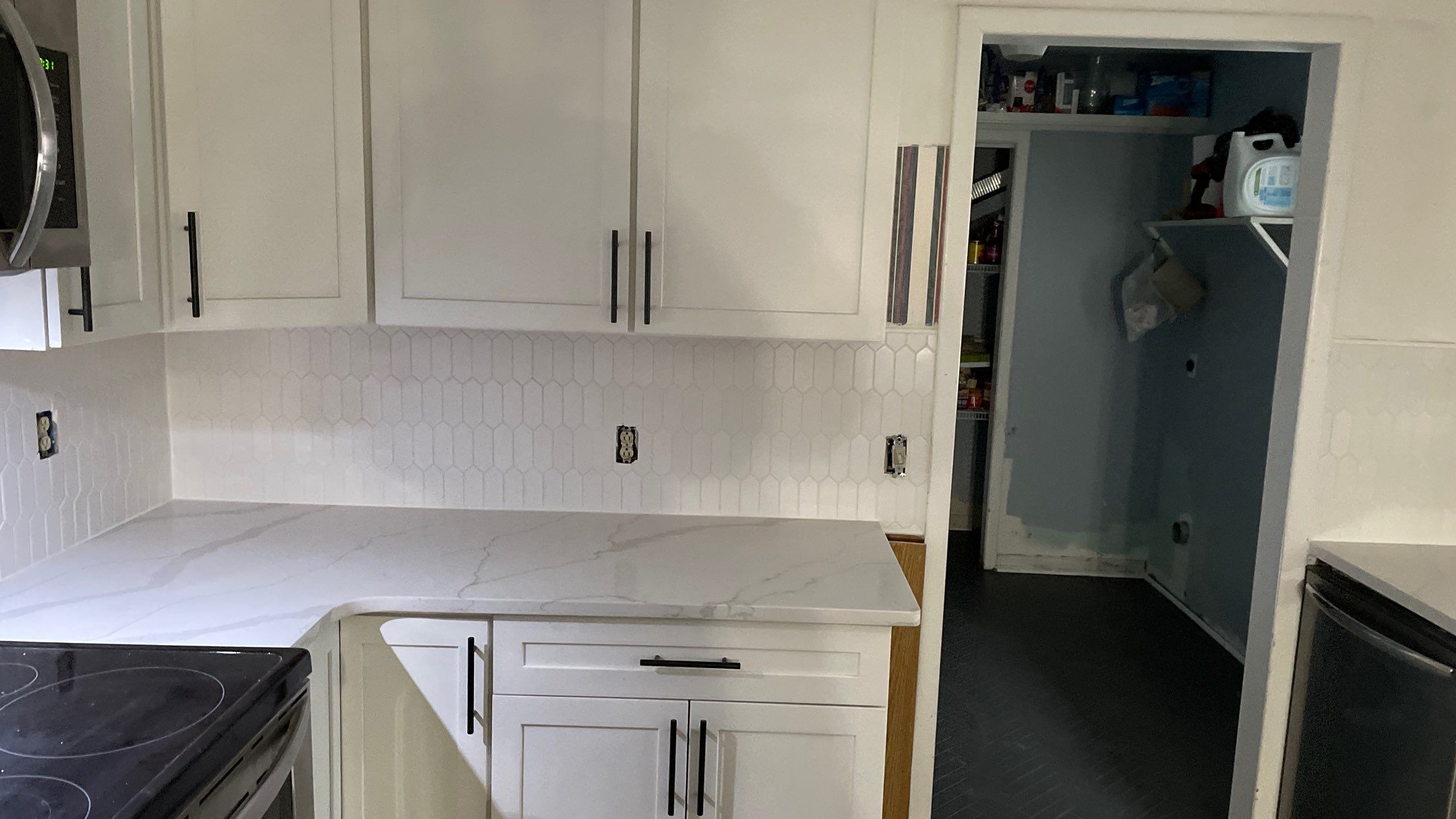 Kitchen Backsplash and Herringbone Tile Floor Remodel by Footprints Floors of Coastal Carolina
