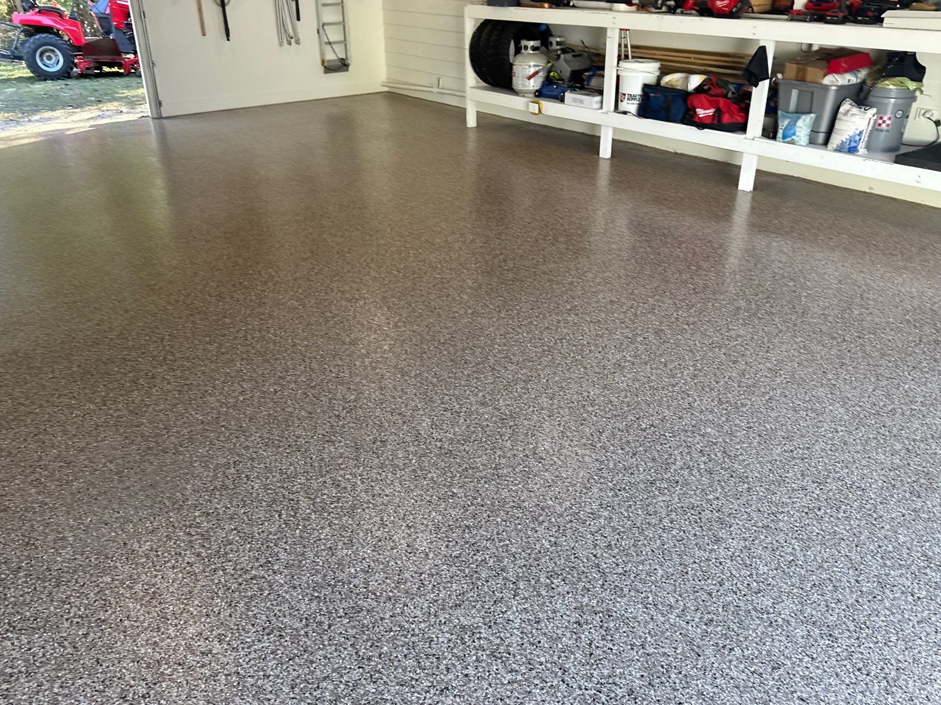 Garage in Hawthorne, FL in Sandstone by Cross Creek Concrete Coatings