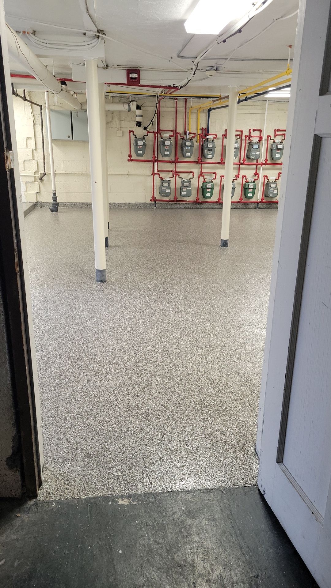 Laundry Room Floor Coating using Penntek- Silver Creek by Spectrum Painting, LLC