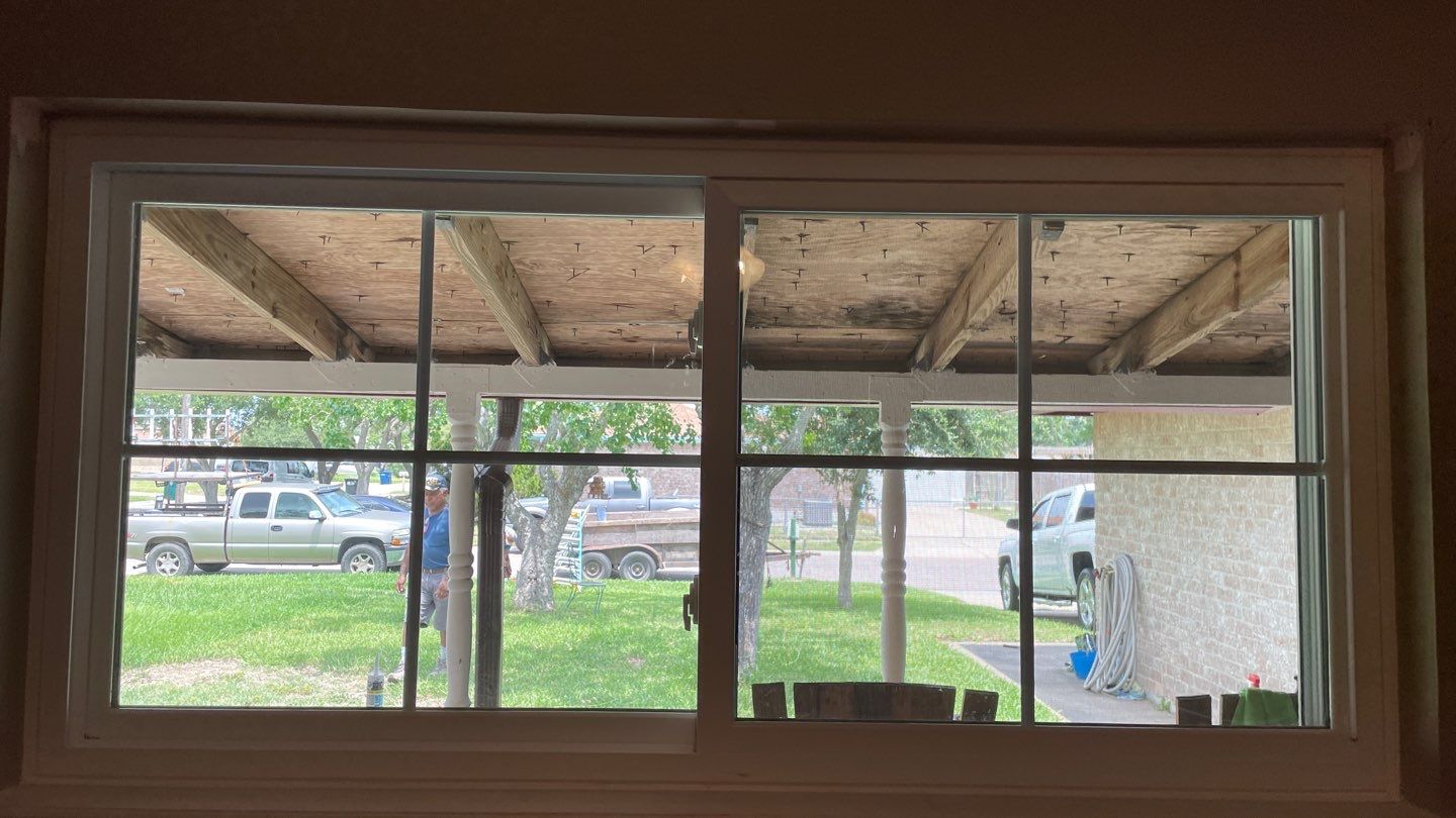 Black and white and red all over by Bayfront Roofing and Construction