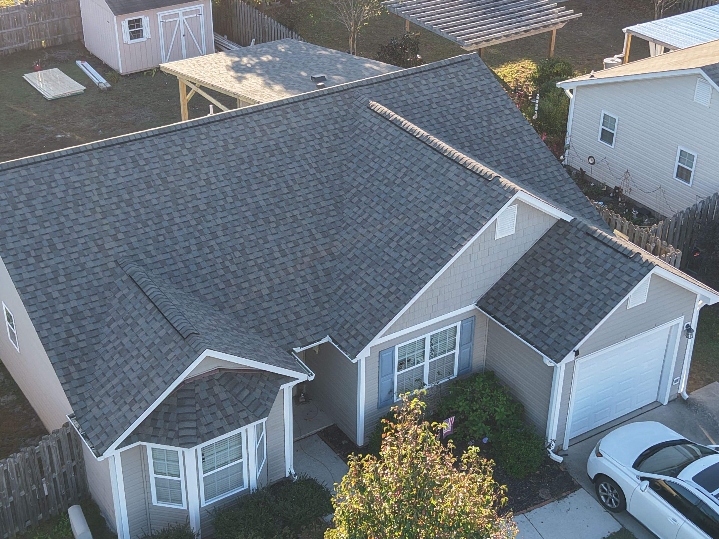 Covered Porch Build and Fortified Roof Replacement with Solar Panels by RGR Construction and Roofing, LLC